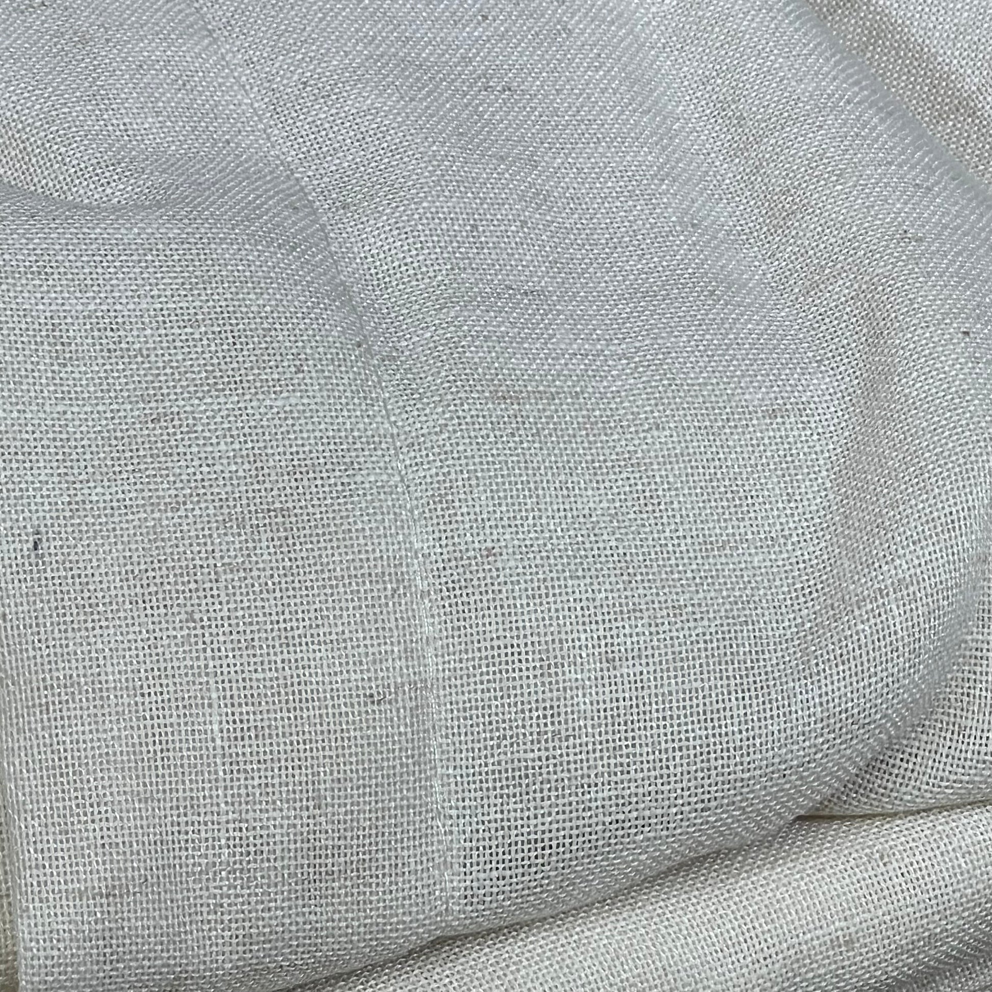 Cream linen fabric texture of XTMYI 94-inch drapes, showcasing quality and elegance for living room or bedroom decor.