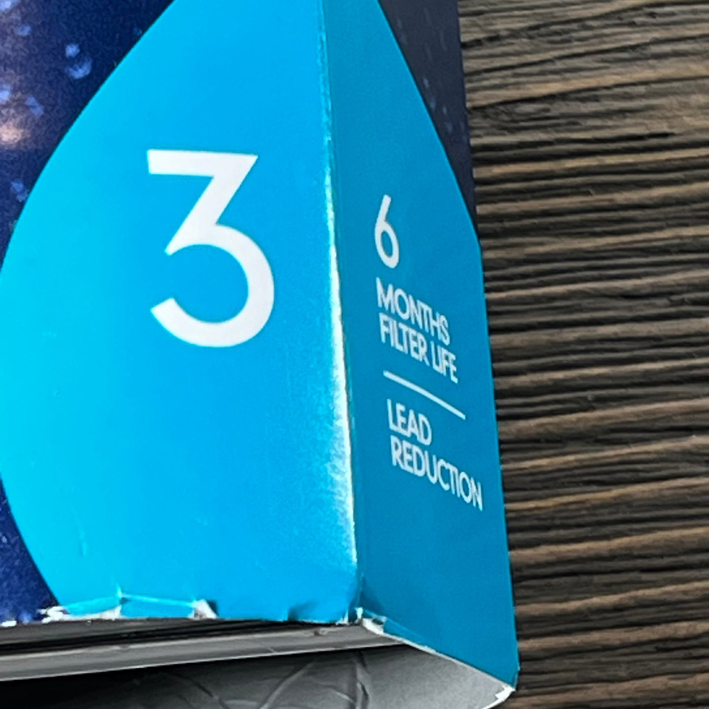 Close-up of everydrop® by Whirlpool Filter 3 packaging highlighting 6-month lifespan and lead reduction benefits.