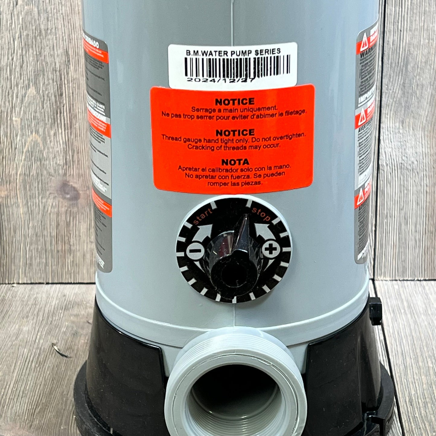 Close-up of Hayward CL200 chlorinator featuring control dial and warning label, ideal for inground pool sanitation.