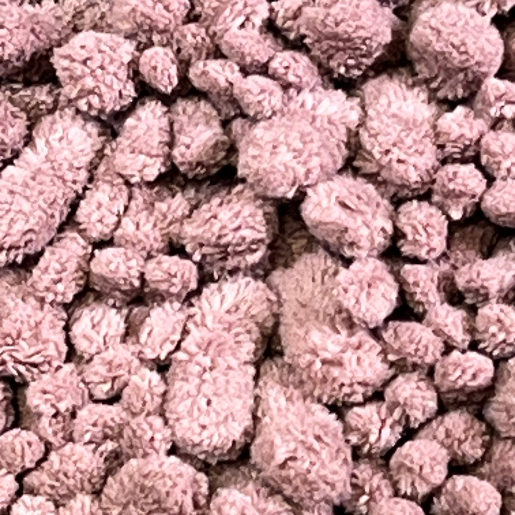 Soft mauve Yimobra bathroom rug mat texture, highlighting plush absorbent fibers for a cozy and modern bathroom decor.