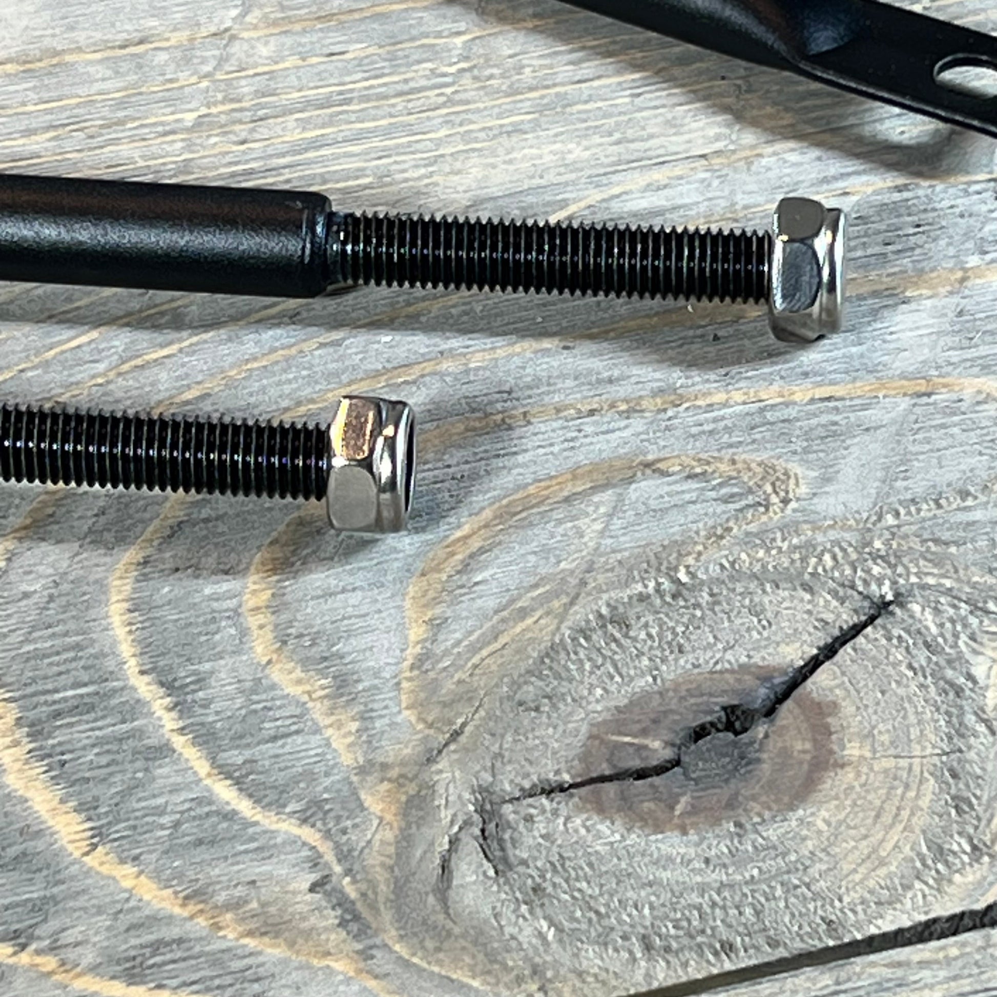 Close-up view of mounting bolts for Anti-Shake Door Off Mirrors compatible with Jeep Wrangler JK JL & Unlimited.