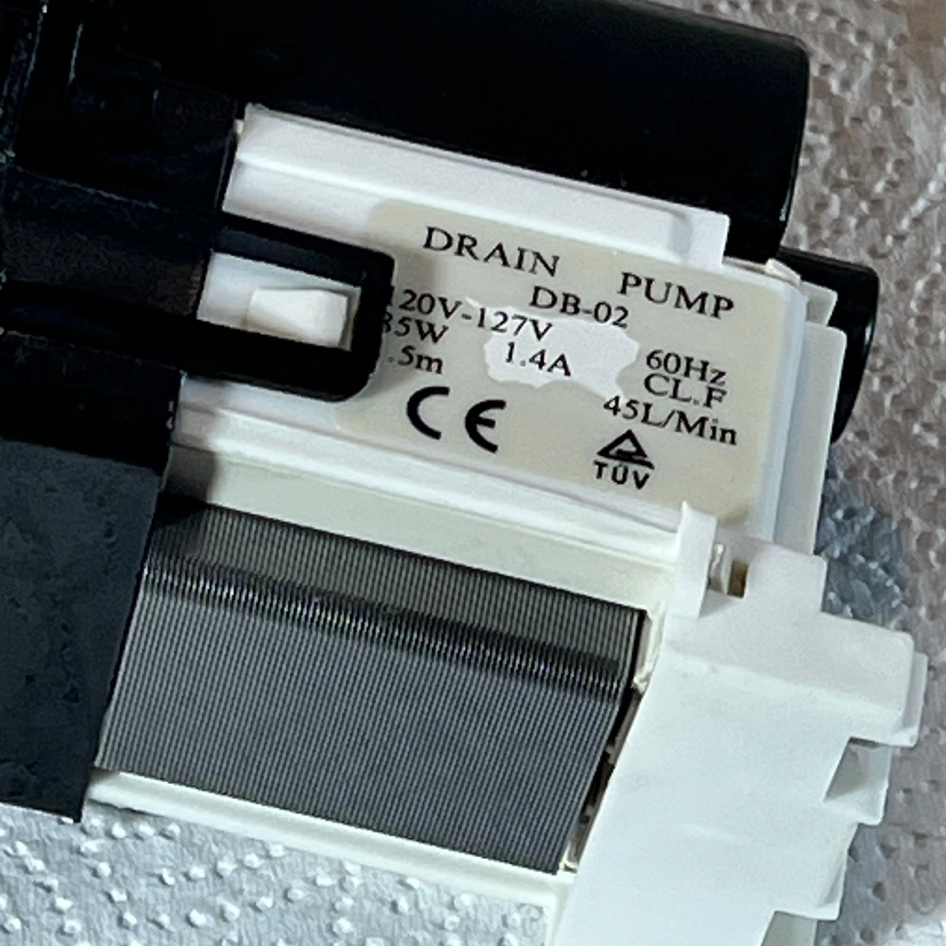 Close-up view of Washer Drain Pump Motor compatible with Kenmore and LG, featuring model details and specifications.