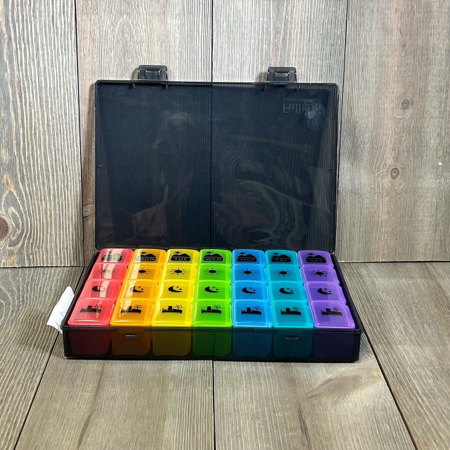 Extra large weekly pill organizer with colorful compartments for vitamins, medicine, and supplements, 4 times a day use.