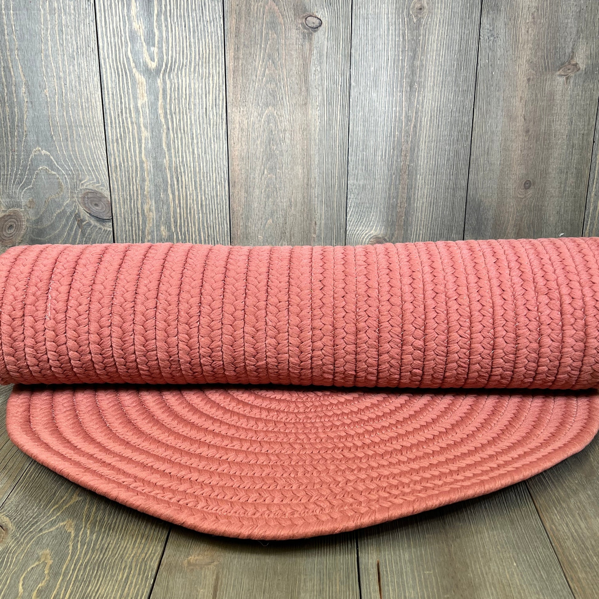 Rusted red braided runner rug, 2x7, handcrafted in USA, perfect for high traffic areas like entryways and kitchens.