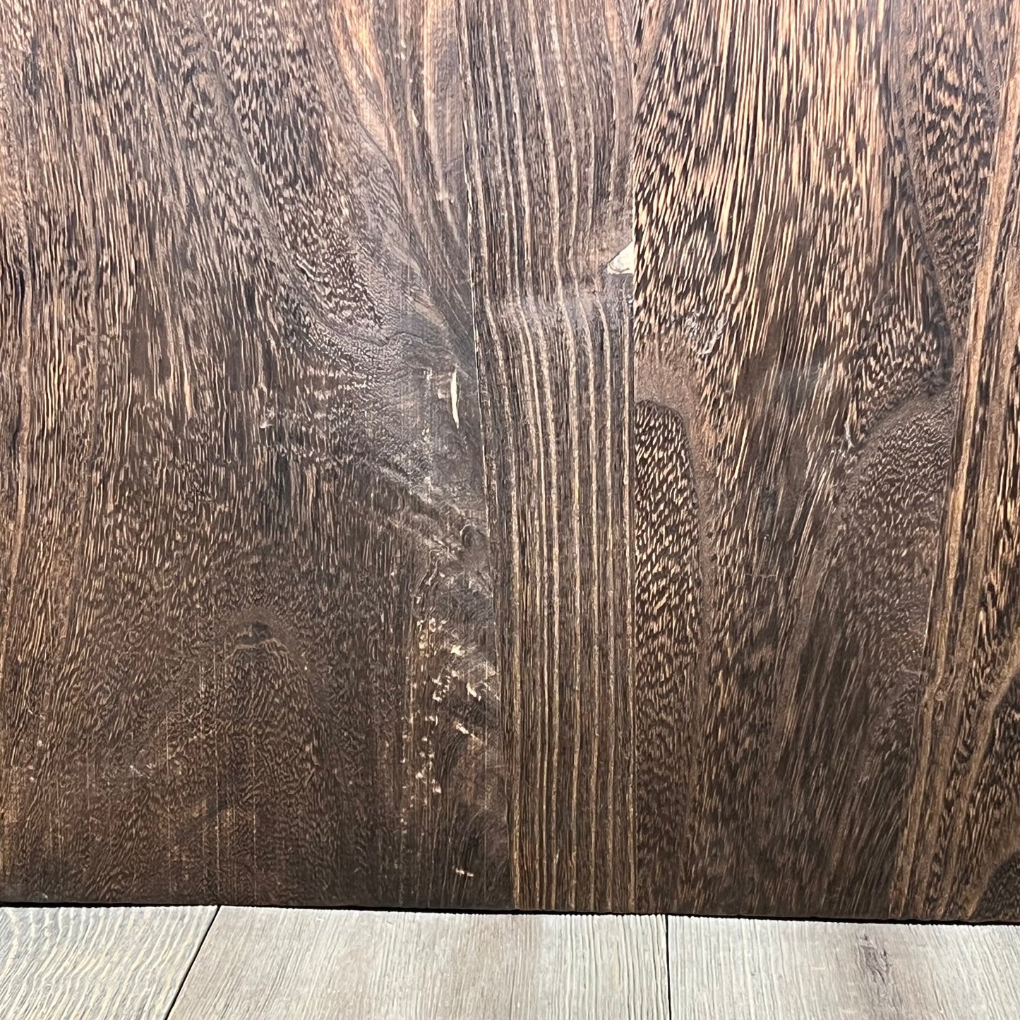 Rustic wooden texture of the GLANT Barn Door Jewelry Organizer, perfect for wall-mounted necklace and earring storage.