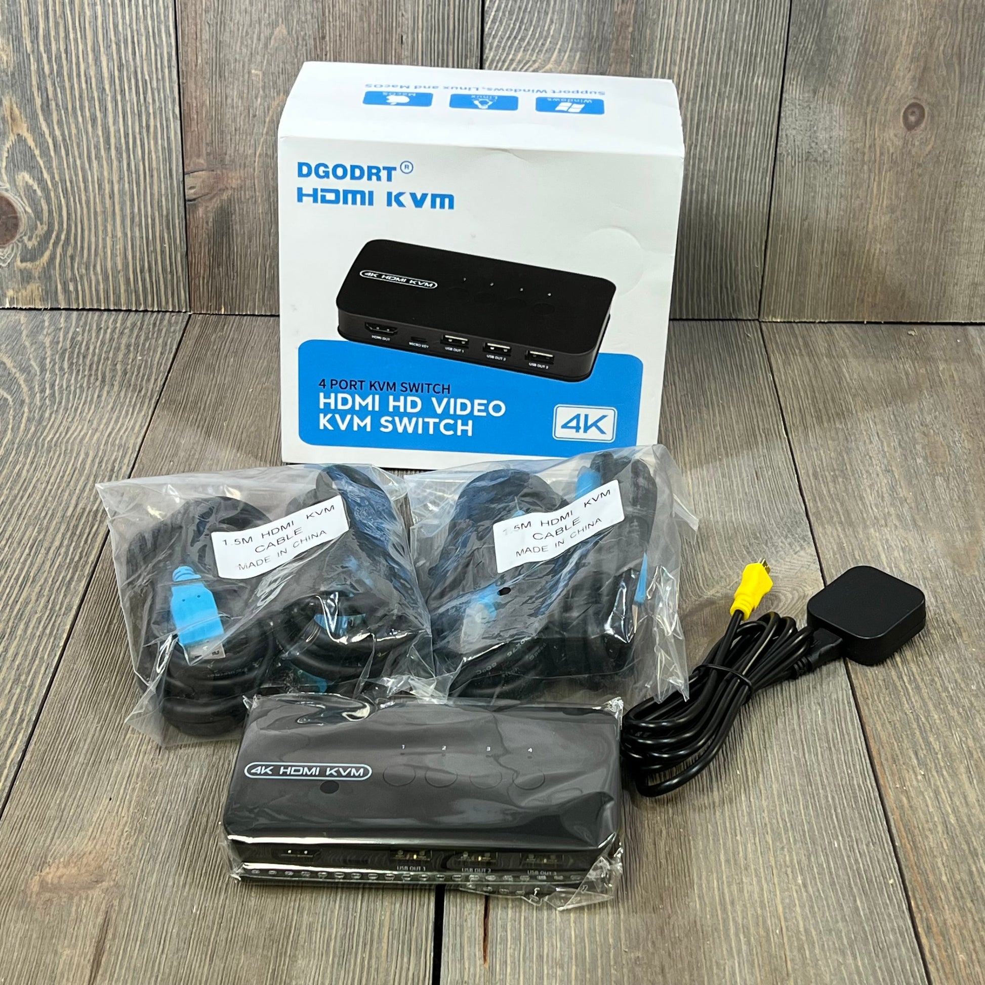 4K HDMI KVM Switch with 4 ports, USB connectivity, and bundled cables, ideal for sharing devices across computers.