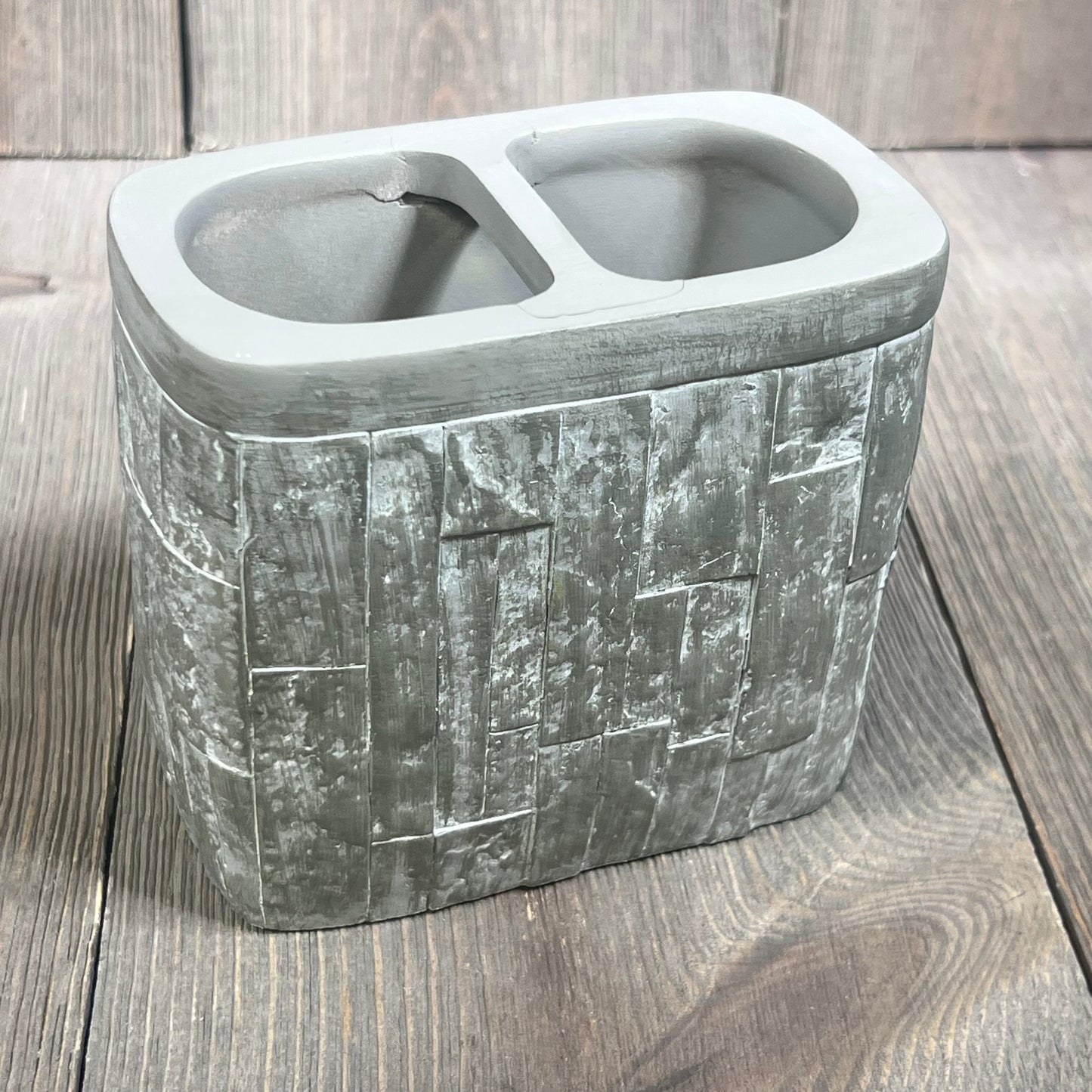 Elegant toothbrush holder with textured gray finish, part of Sweet Home Collection's modern bathroom accessories set.