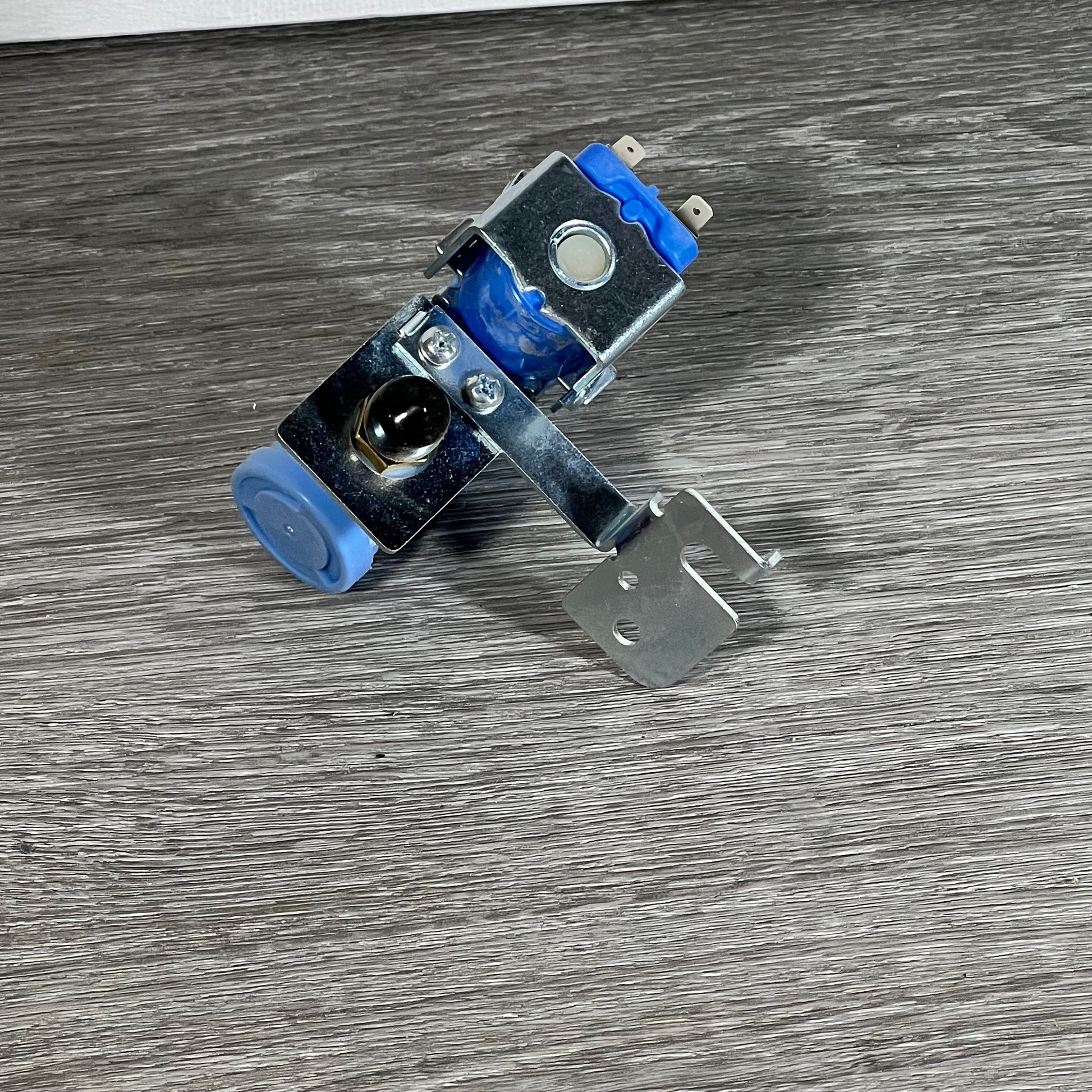 Durable BlueStars MJX41178908 water inlet valve with metal bracket for LG and Kenmore refrigerators.
