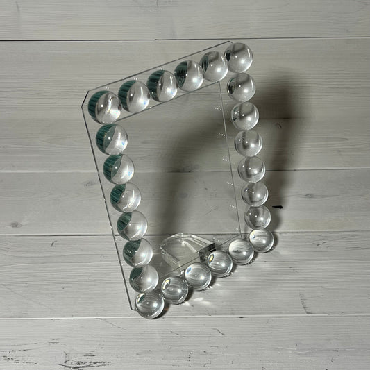 Elegant 5x7 crystal picture frame with 24 clear bubble accents, perfect for desk or home display.