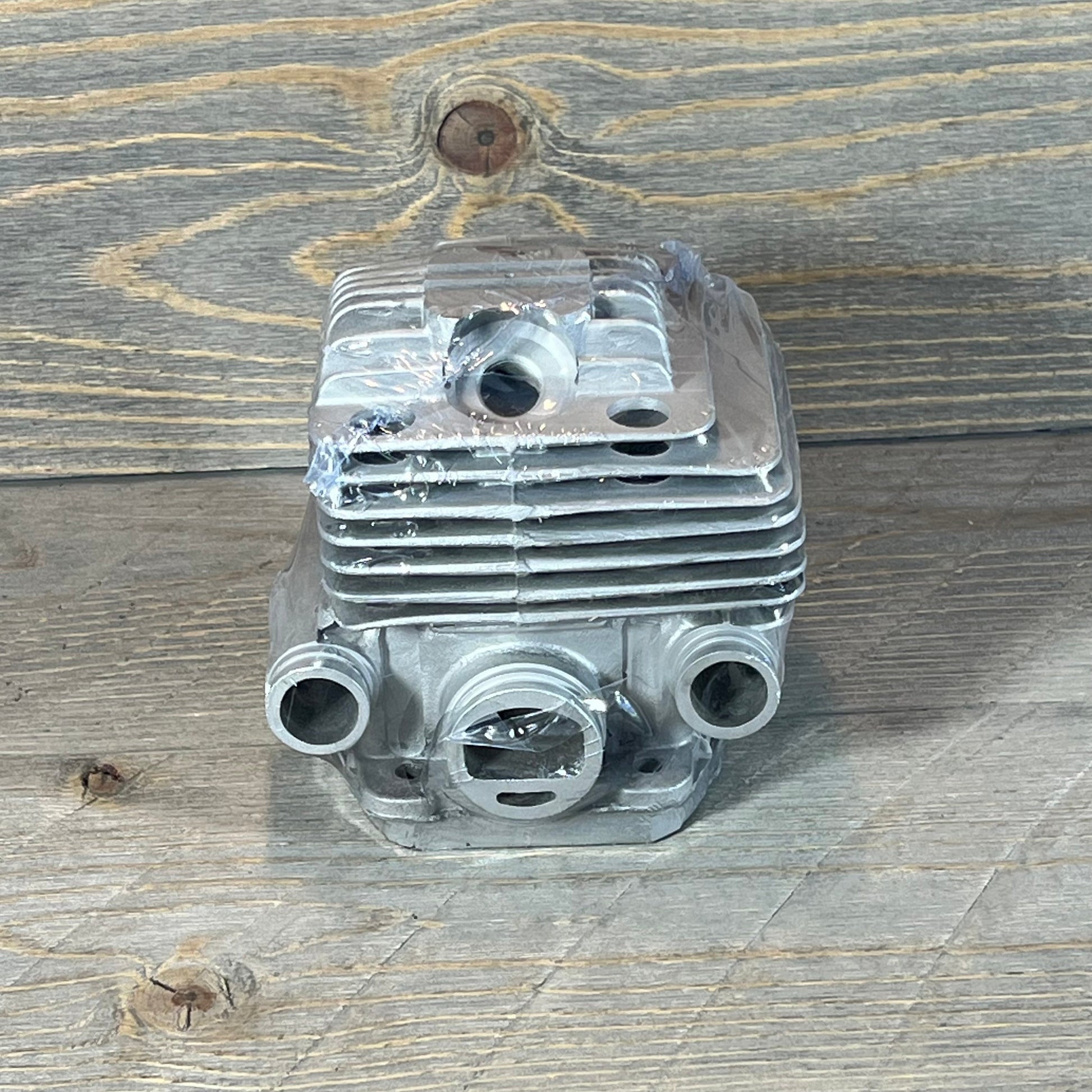 Front view of Yingspart 56mm Cylinder Piston Kit for Stihl TS700 TS800, highlighting its robust design on wooden background.