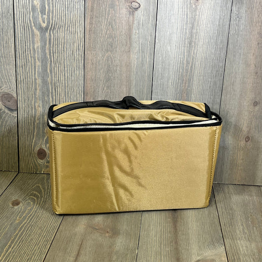 Gold camera insert bag divider with handle, perfect for organizing DSLR gear in your backpack.
