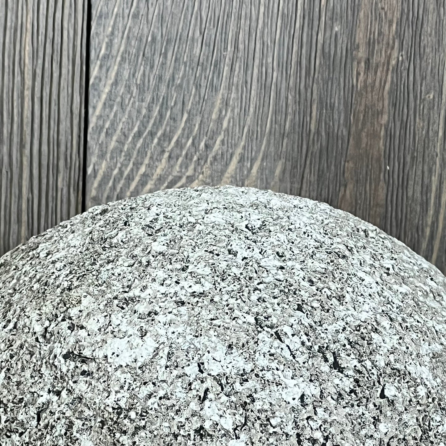 Modern gray polyresin sculpture with textured surface, ideal for contemporary home decor and artistic displays.