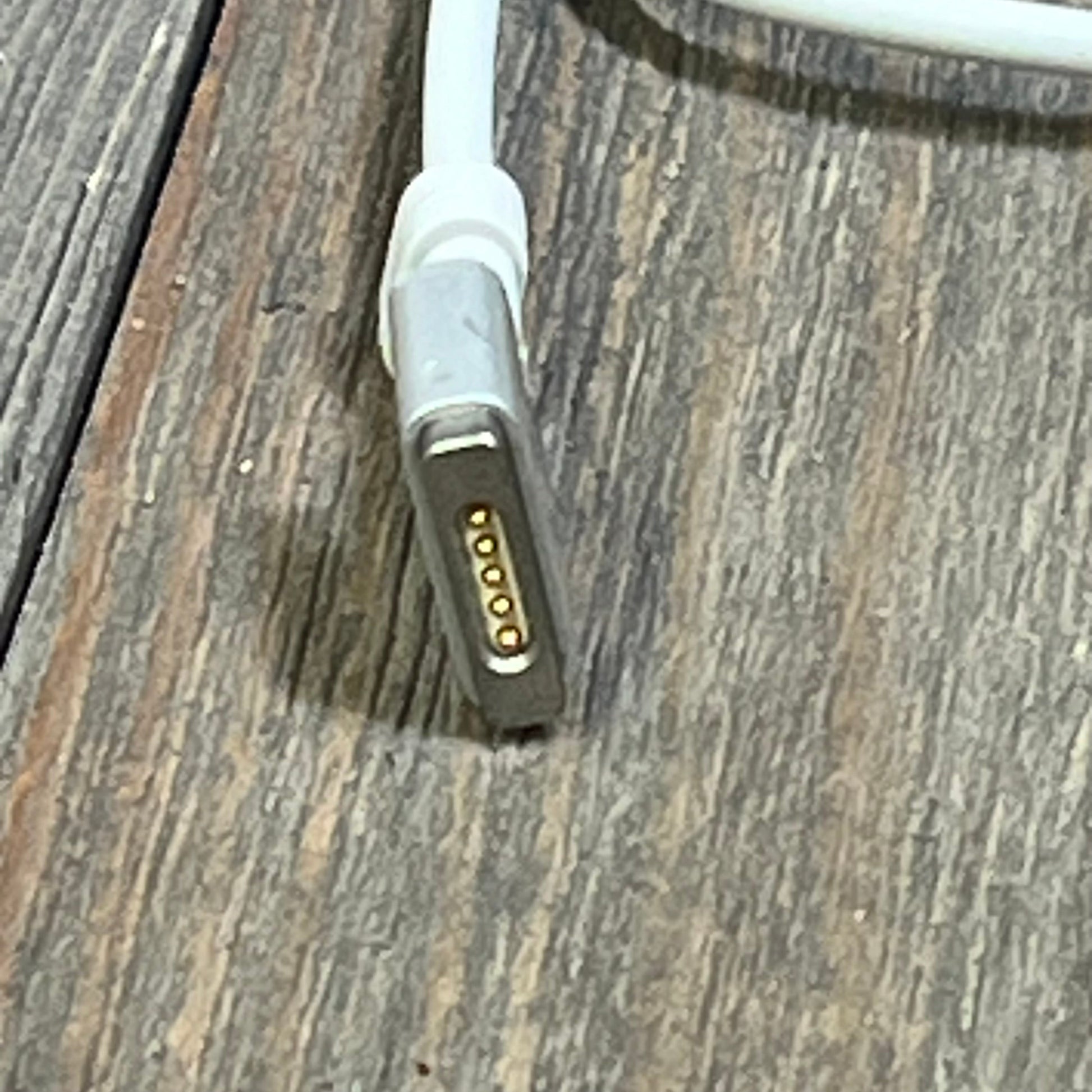 Close-up of 6.6FT Type C to Magnetic 3 cable with LED for MacBook Pro 16/14 inch, compatible 2021-2025 models.