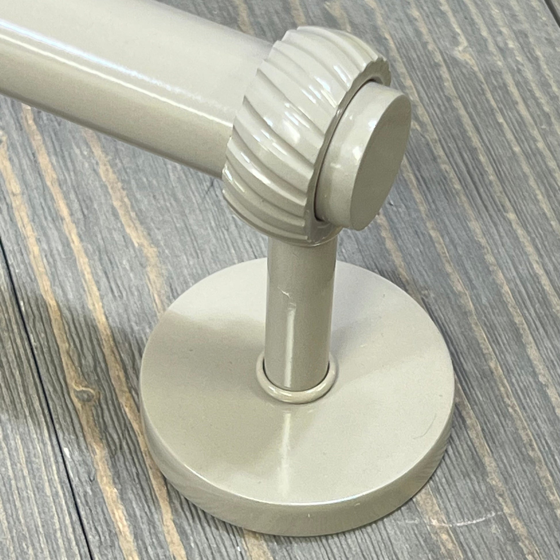 Shaded beige towel bar with twist detail from the Allied Brass Satellite Orbit Two Collection, showcasing base and mount design.