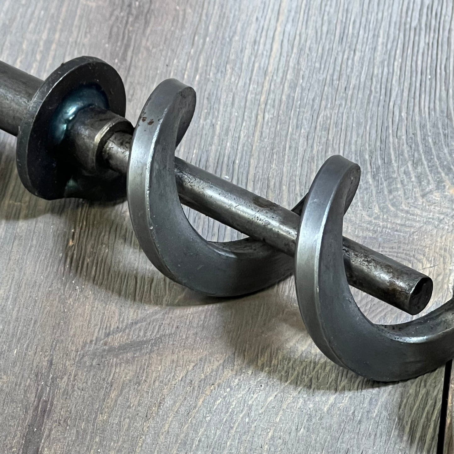 17-inch auger shaft screw for Traeger pellet grills, durable steel construction, essential for grill maintenance.