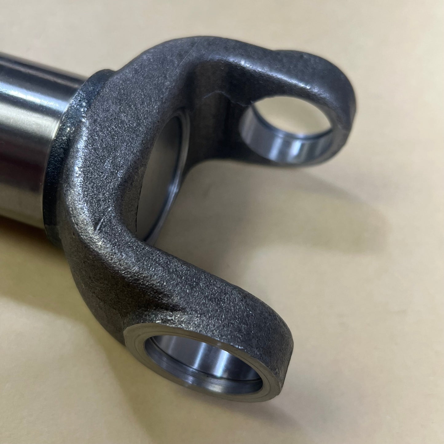 Close-up of 1045688182-3-3-2431X Slip Yoke compatible with GM Turbo 400, featuring durable metal construction for TH400.