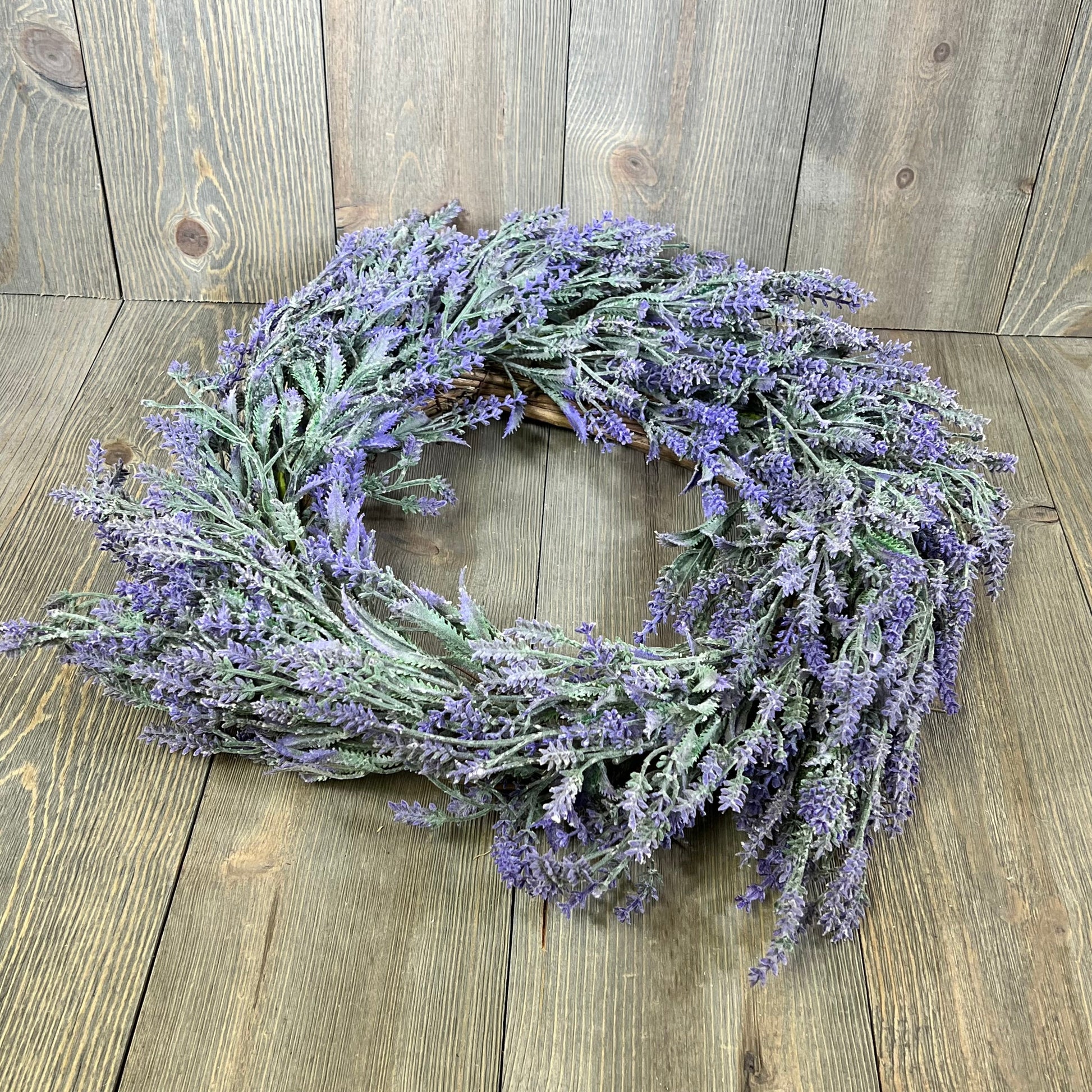 Lavender wreath with lush purple blooms, perfect for a summer front door or farmhouse décor.