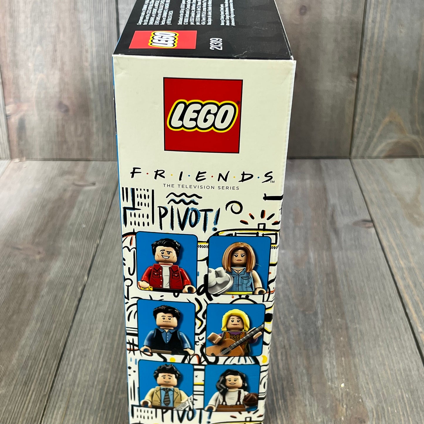 Friends Lego Box featuring character minifigures from the iconic TV show, detailed side view with vibrant packaging design.
