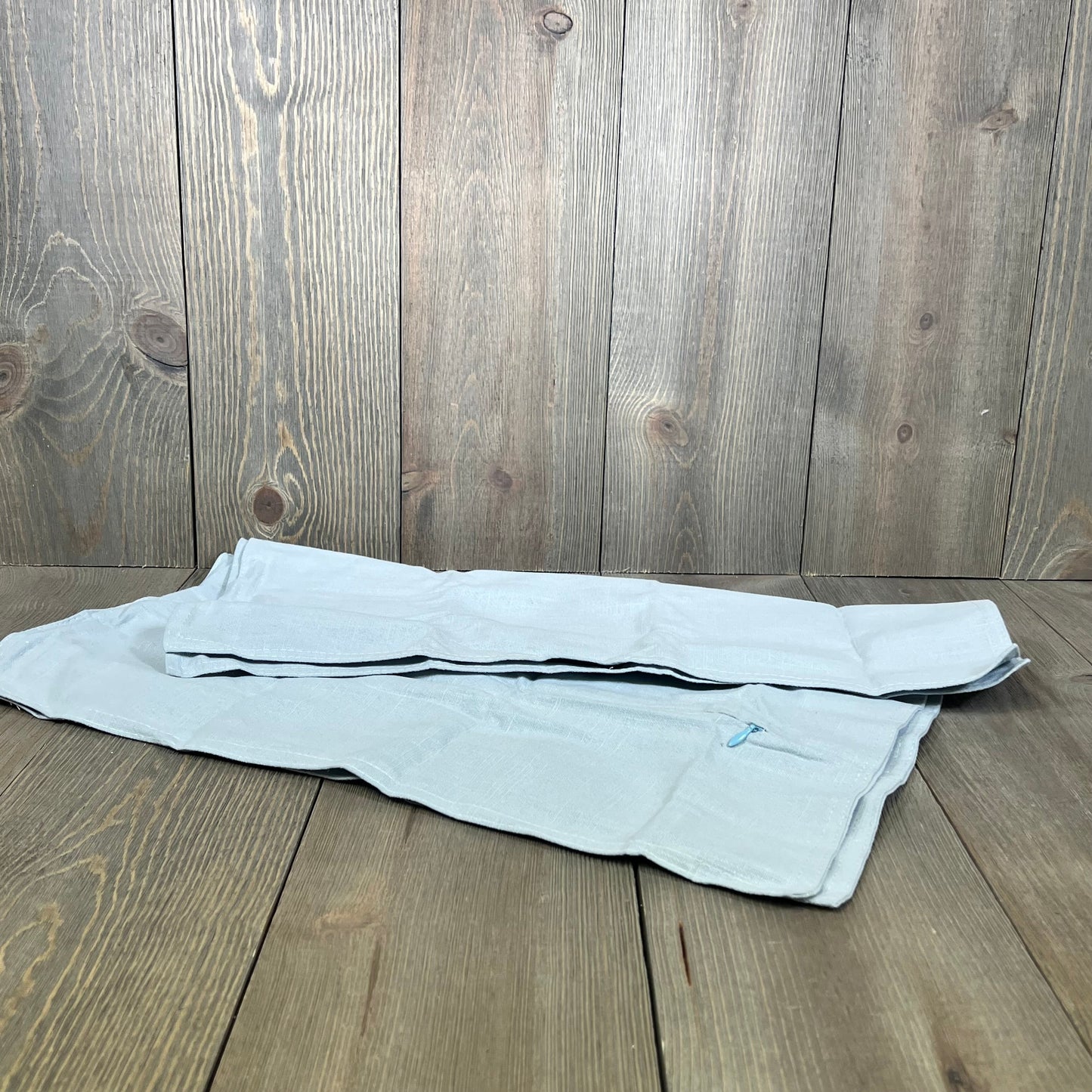 Light blue MIULEE decorative linen pillow covers on wooden surface, perfect for boho farmhouse decor and modern living rooms.