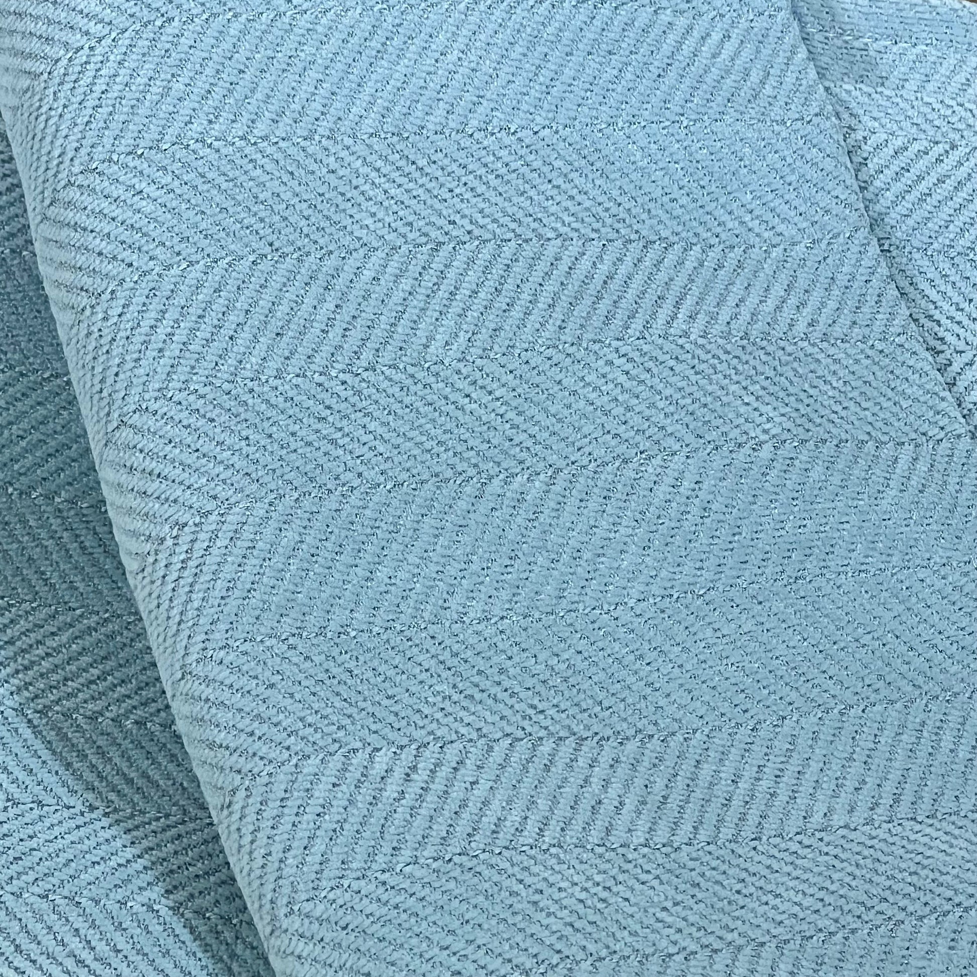 Elegant light blue chenille pillow cover with a soft, luxurious texture, perfect for enhancing home decor.