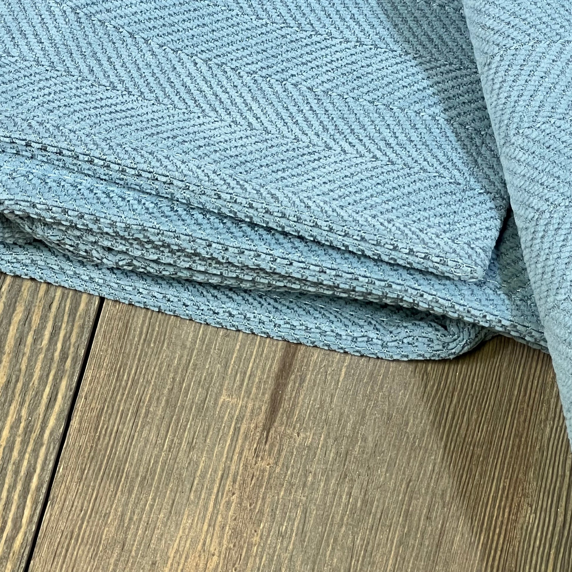 Light blue chenille pillow covers with elegant design, perfect for enhancing your couch or bed decor with a luxurious touch.