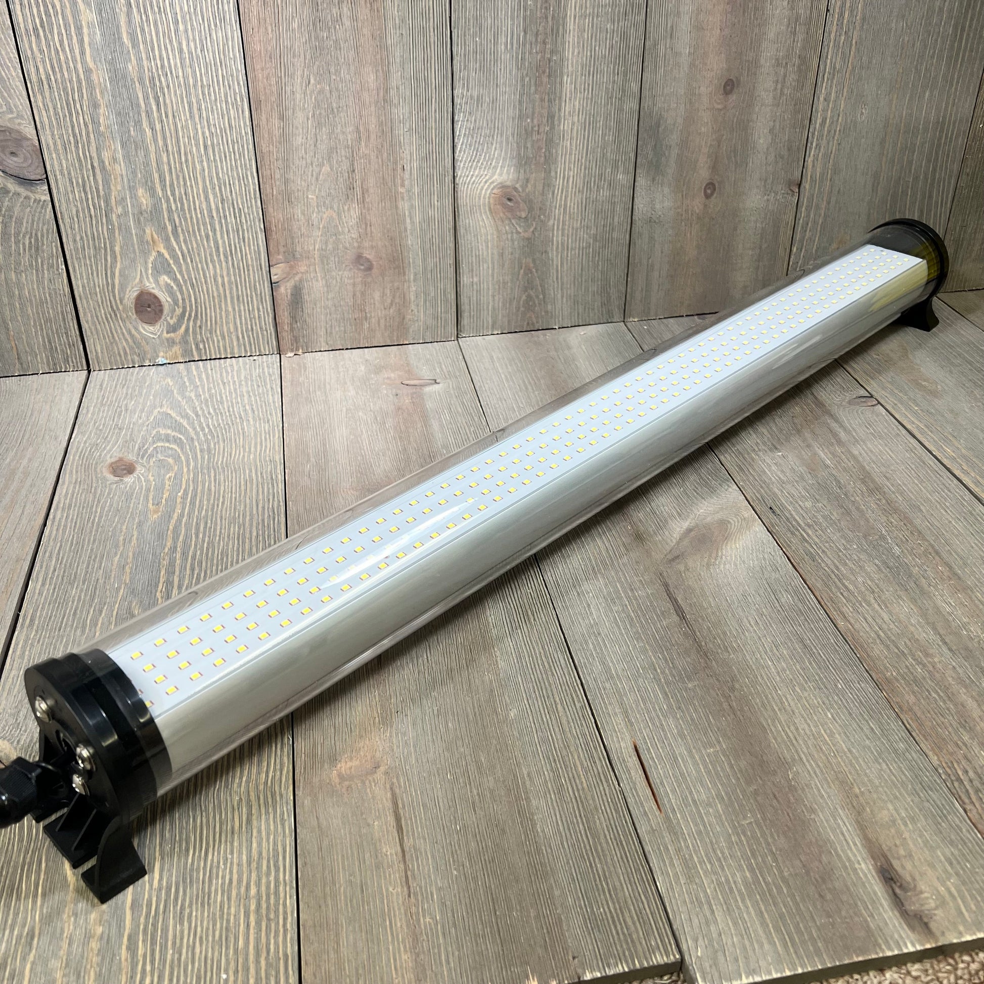 Explosion-proof LED machine light tube with durable design for CNC, IP66 rated, 25W, suitable for 110V-220V industrial use.