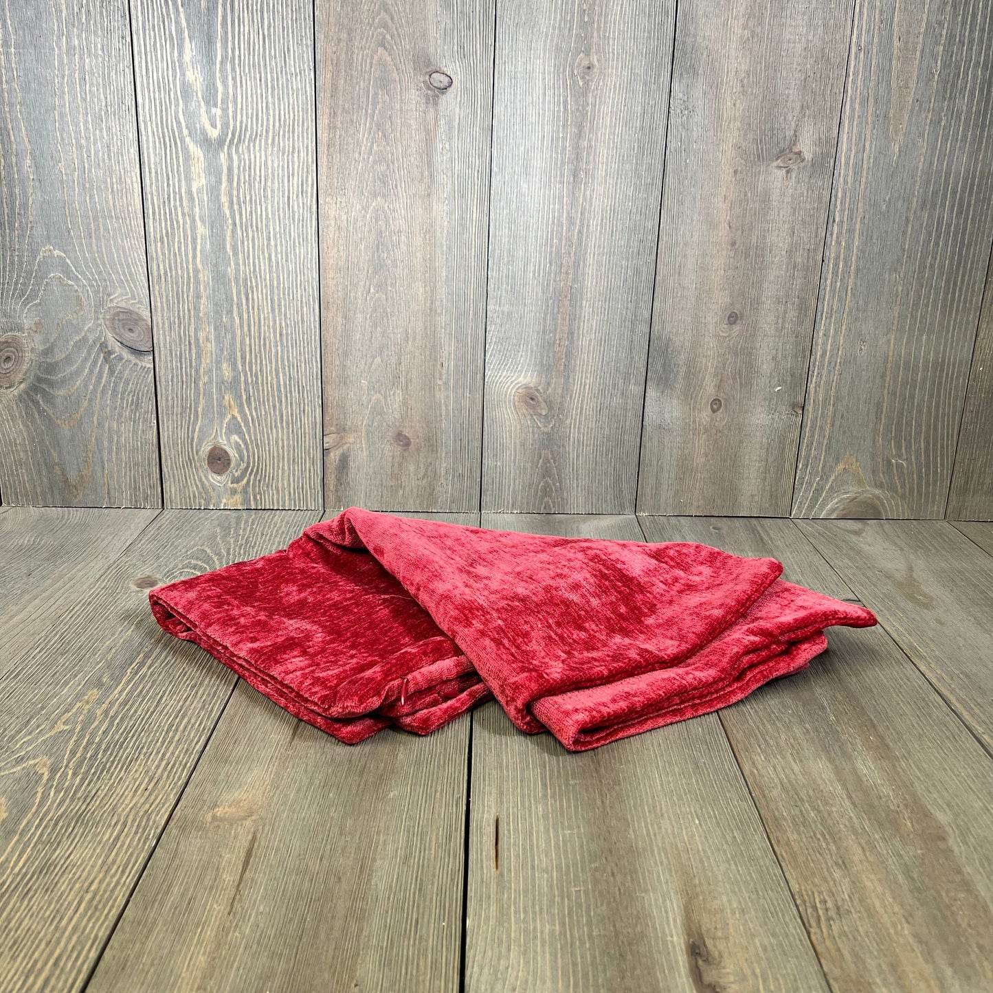 Bright red chenille throw pillow covers on rustic wood, perfect for farmhouse decor. Super soft, 18x18 inches, set of 2.
