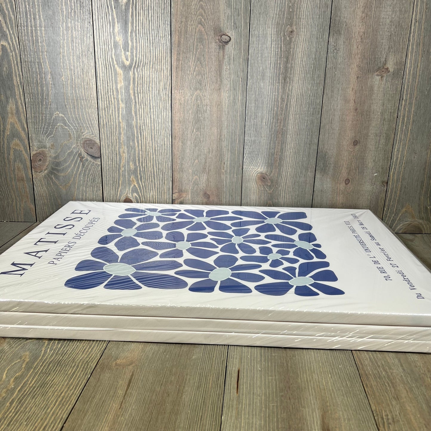 Set of three Henri Matisse navy blue floral canvas posters, minimalist and trendy, perfect for bedroom or living room decor.