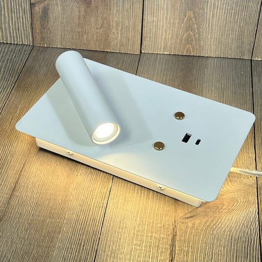 Dimmable wall-mounted reading light with USB A+C ports and touch control in sleek white design, perfect for bedside use.