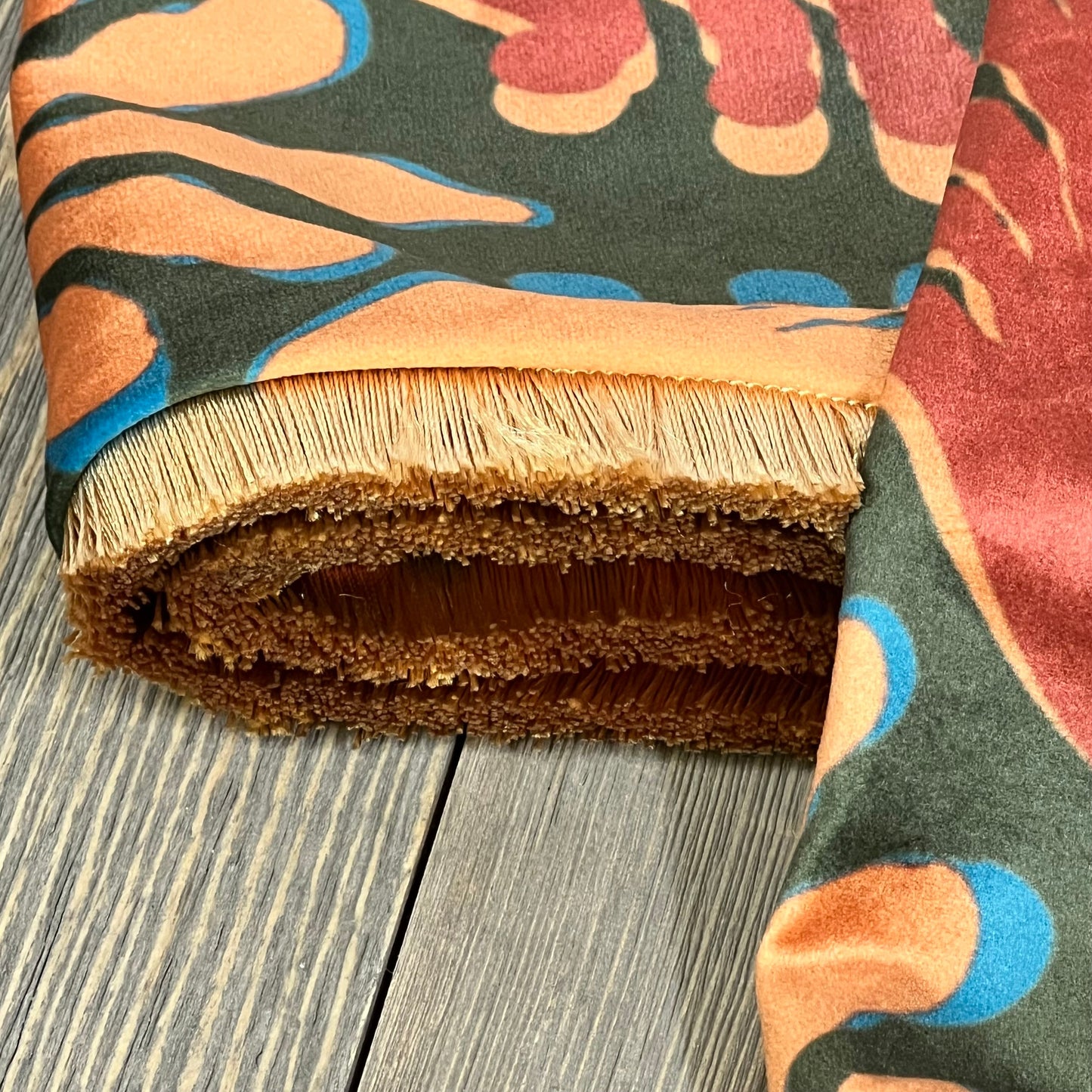 Velvet throw pillow cover in farmhouse yellow with a brown palm leaves pattern, showcasing detailed fringe edges.