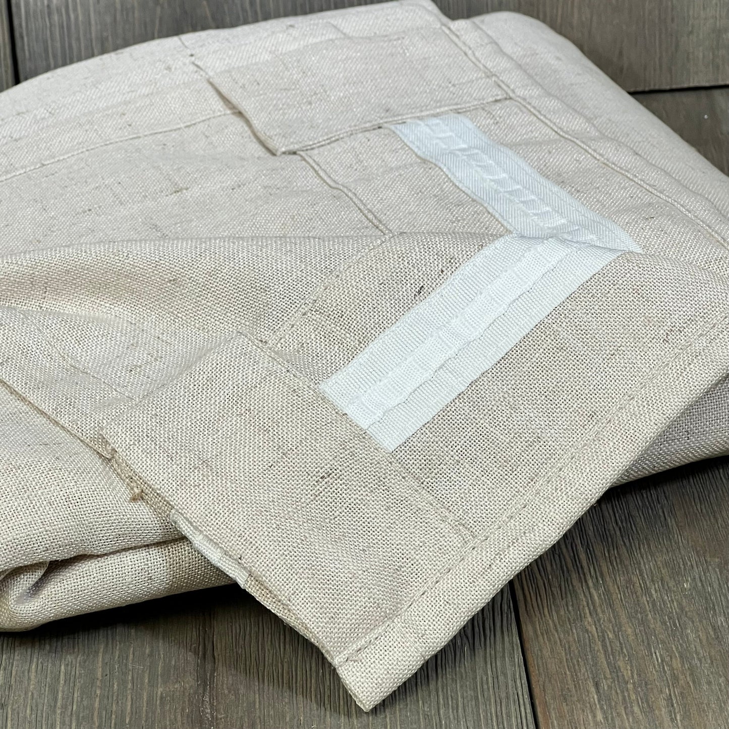 Linen curtains with rod pocket and back tab design, offering a soft, thick texture for light filtering in farmhouse decor.