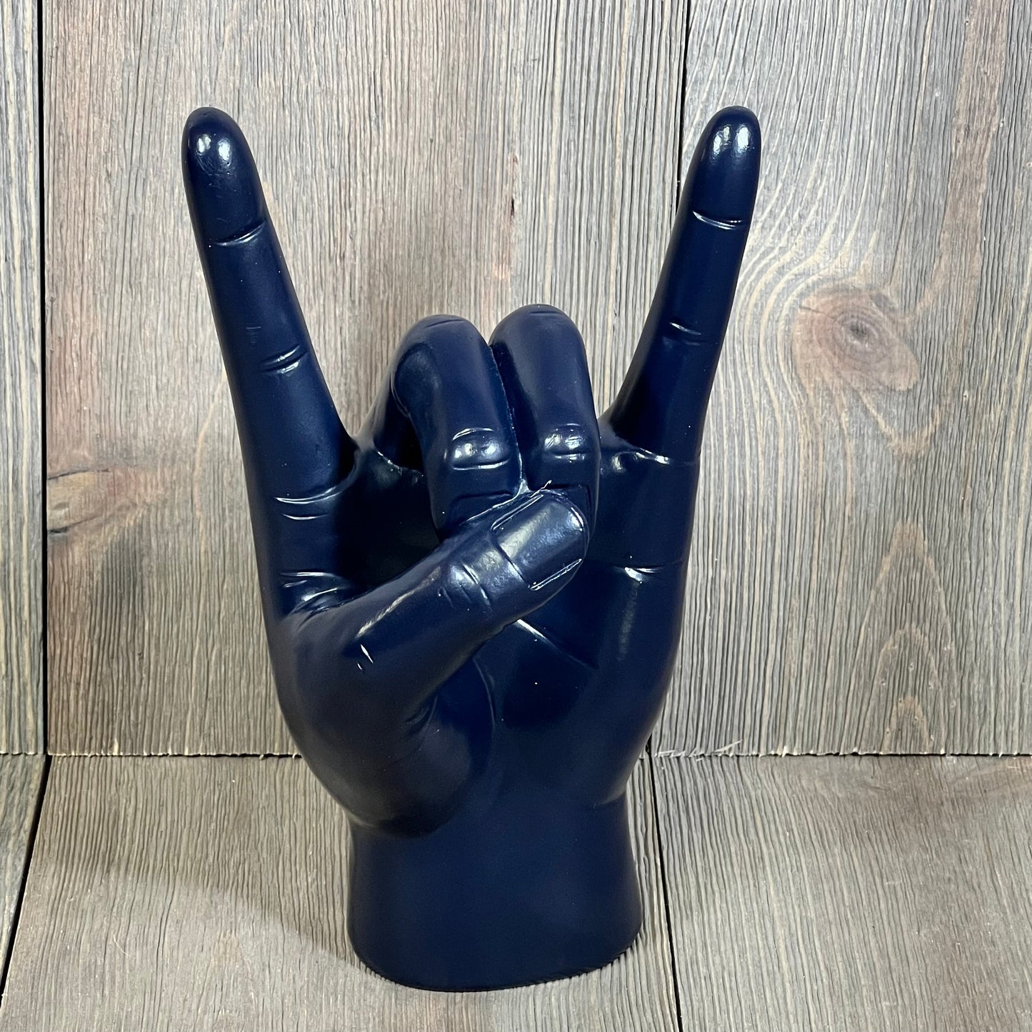 Blue resin rock hand sculpture, ideal for music lovers and modern decor, 7.7" tall for home or office display.