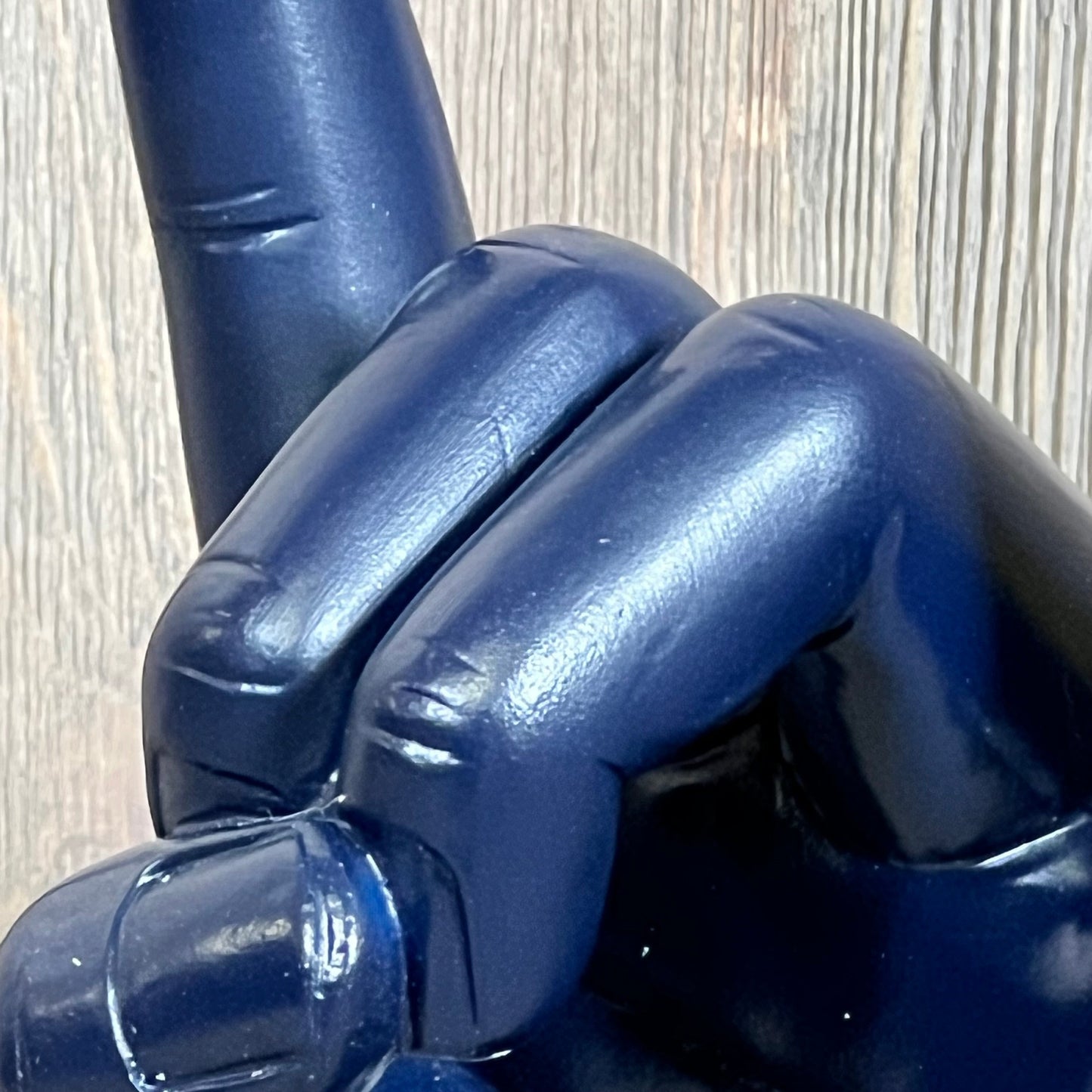 Blue resin rock on hand gesture statue, perfect for home and office decor, symbolizes rock culture and music lovers.