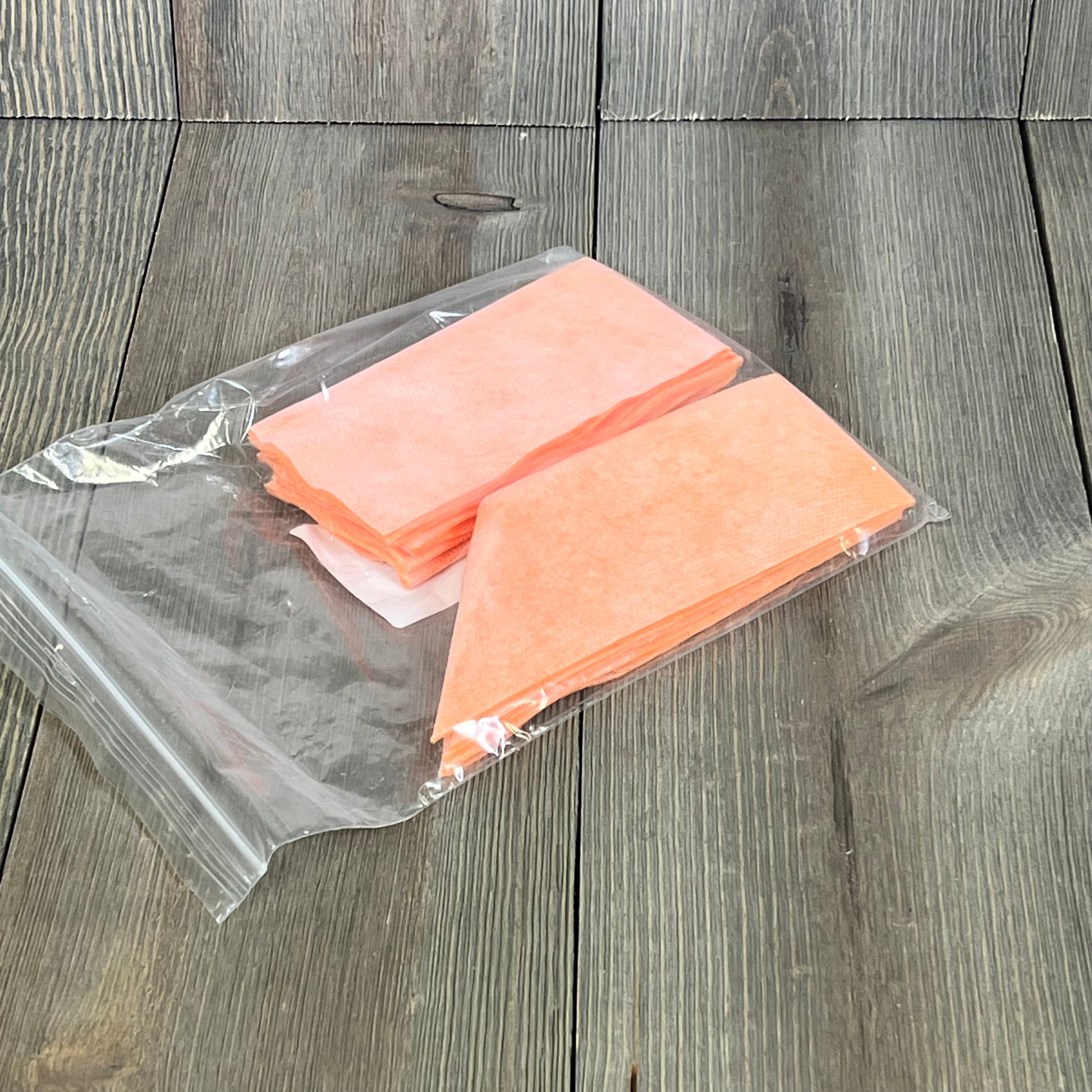 Orange waterproofing corner covers for shower and steam room, packaged for easy installation and durability.