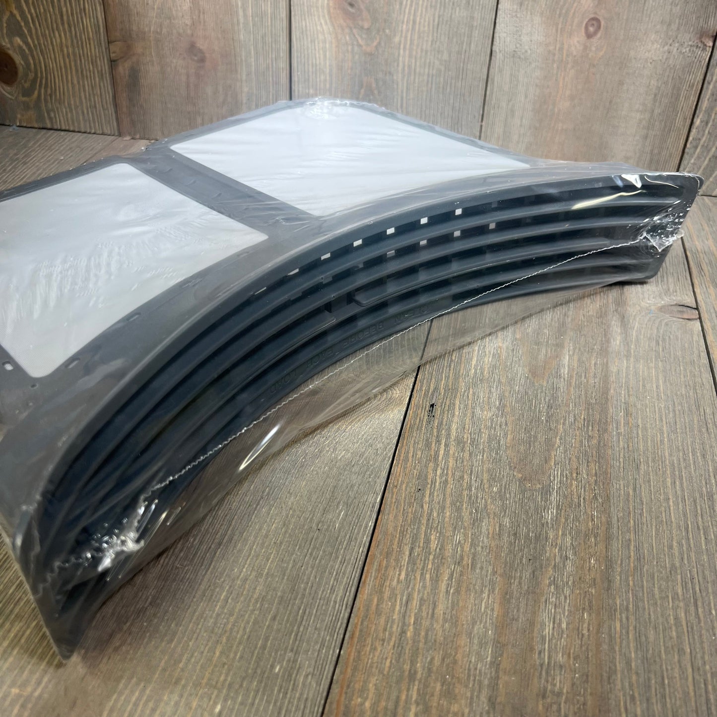 Replacement screen filter for dryers, compatible with Frigidaire, Electrolux, Kenmore, shown in clear packaging.