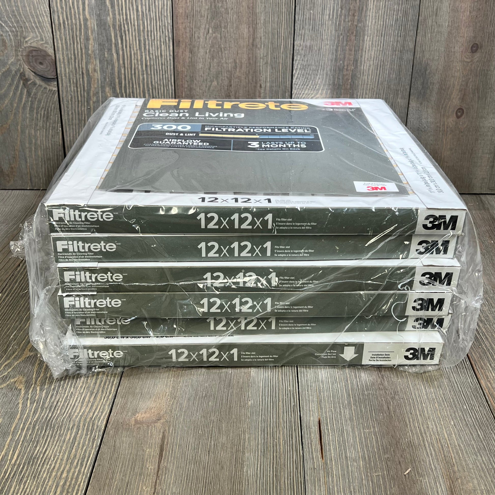 Pack of 3M Filtrete 12x12x1 air filters, designed for dust and pet defense, wrapped in protective plastic.