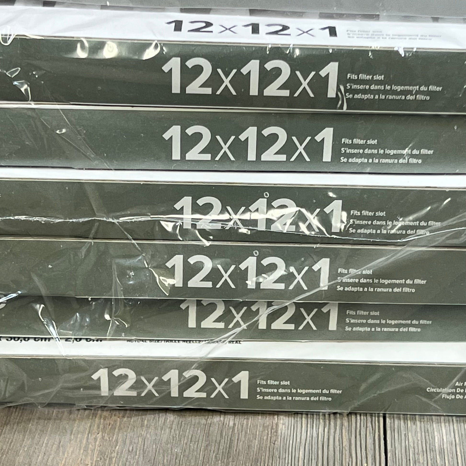 Stack of BNX TruFilter 12x12x1 Air Filters, MERV 8, in protective packaging, perfect for dust and pet defense.