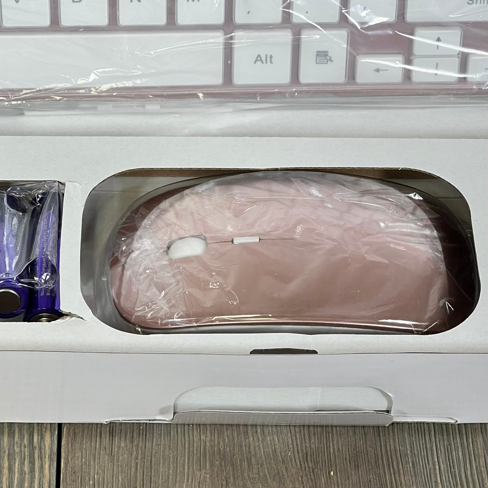 Rose Gold wireless mouse in packaging with USB receiver and batteries, part of TopMate slim keyboard combo for PC and Mac.