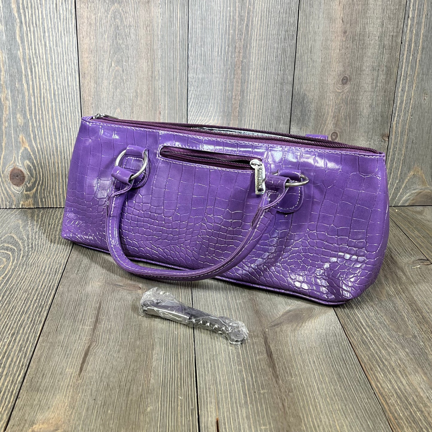 Trendy purple Primeware wine clutch bag with crocodile texture, thermal-insulated for 750mL bottles, includes corkscrew.