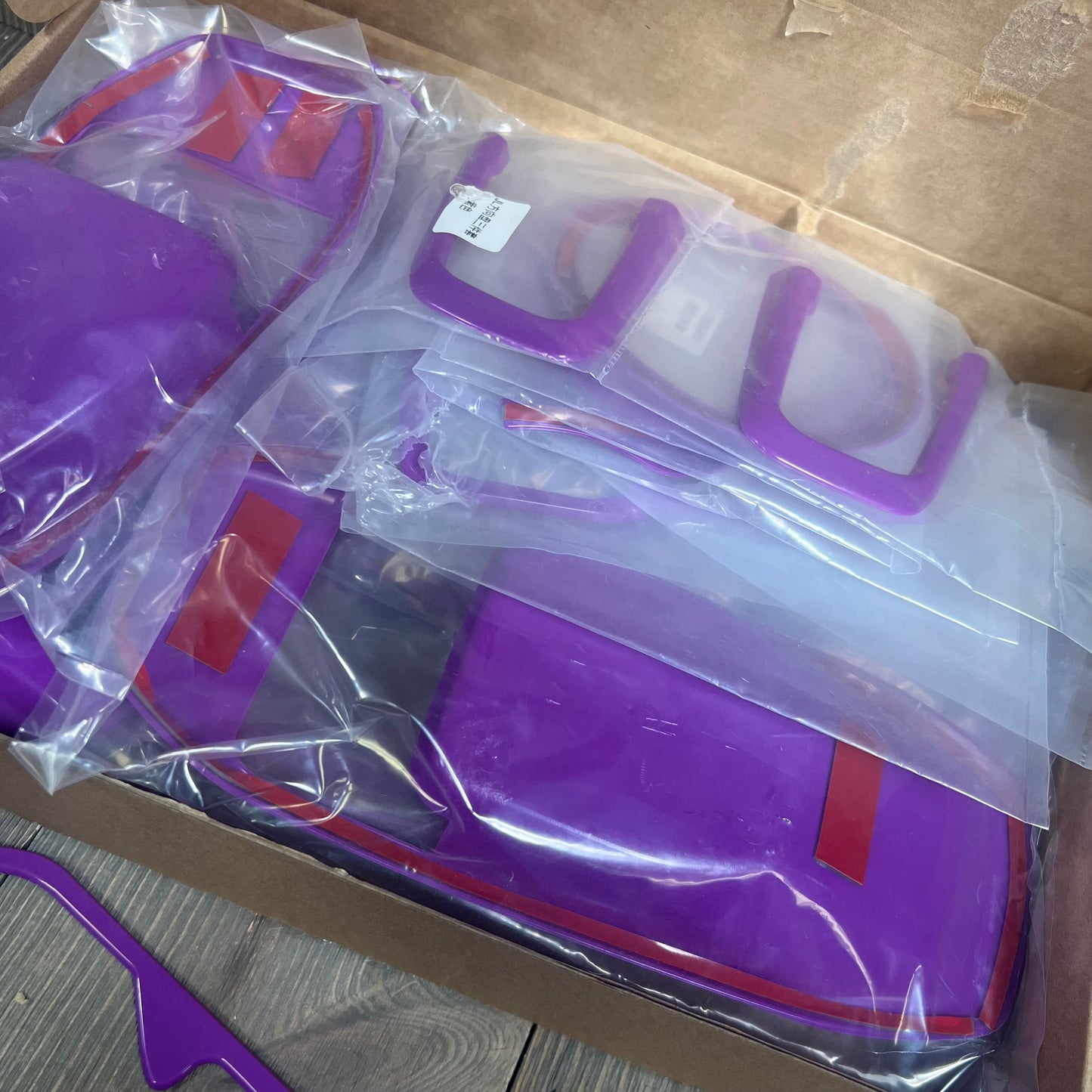 Purple interior trim kit for Jeep Wrangler JL JLU Gladiator JT 2018-2023, including steering wheel and door handle covers.