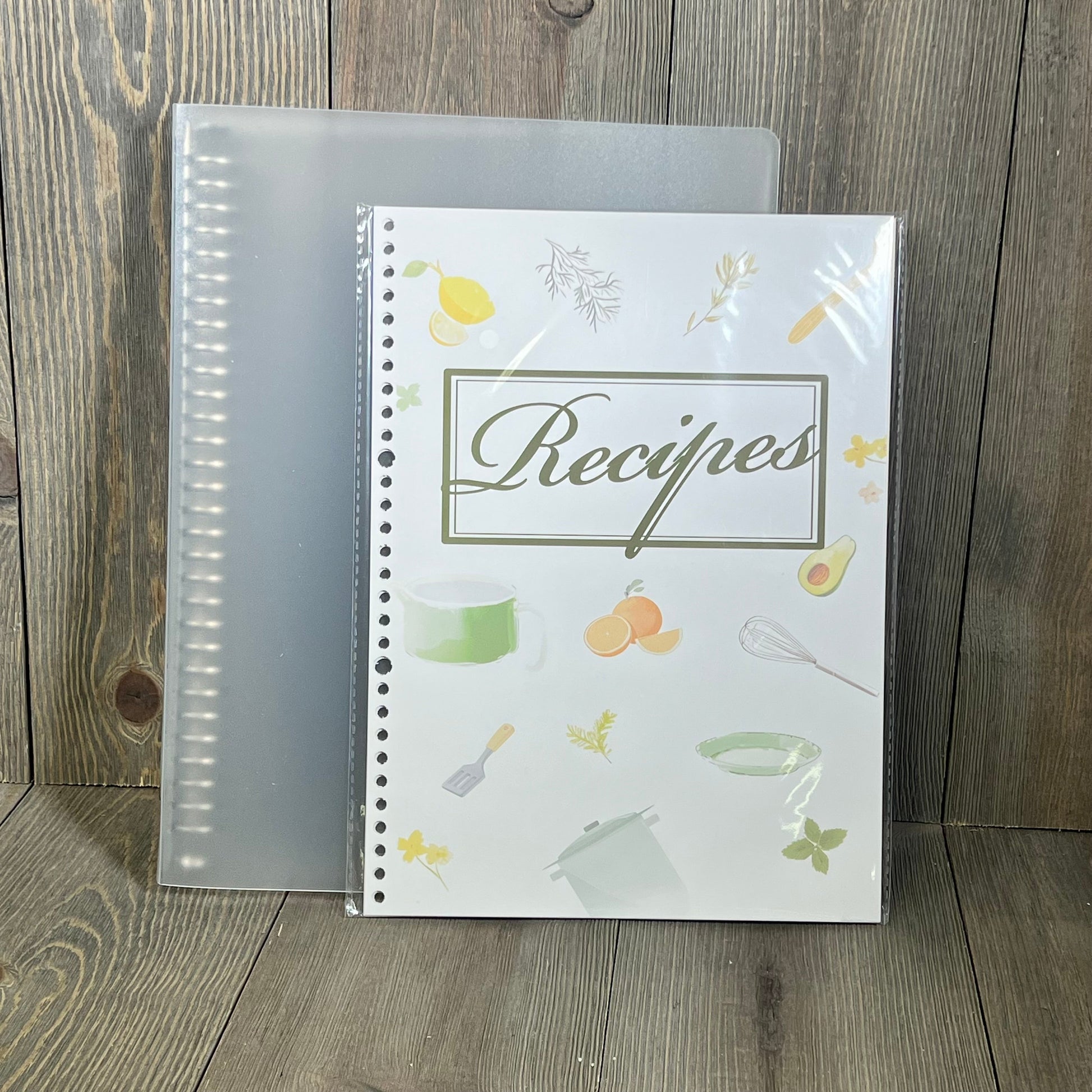 Recipe book with a decorative cover, featuring blank pages for personal recipes, 8 dividers, and 24 tabs for organization.