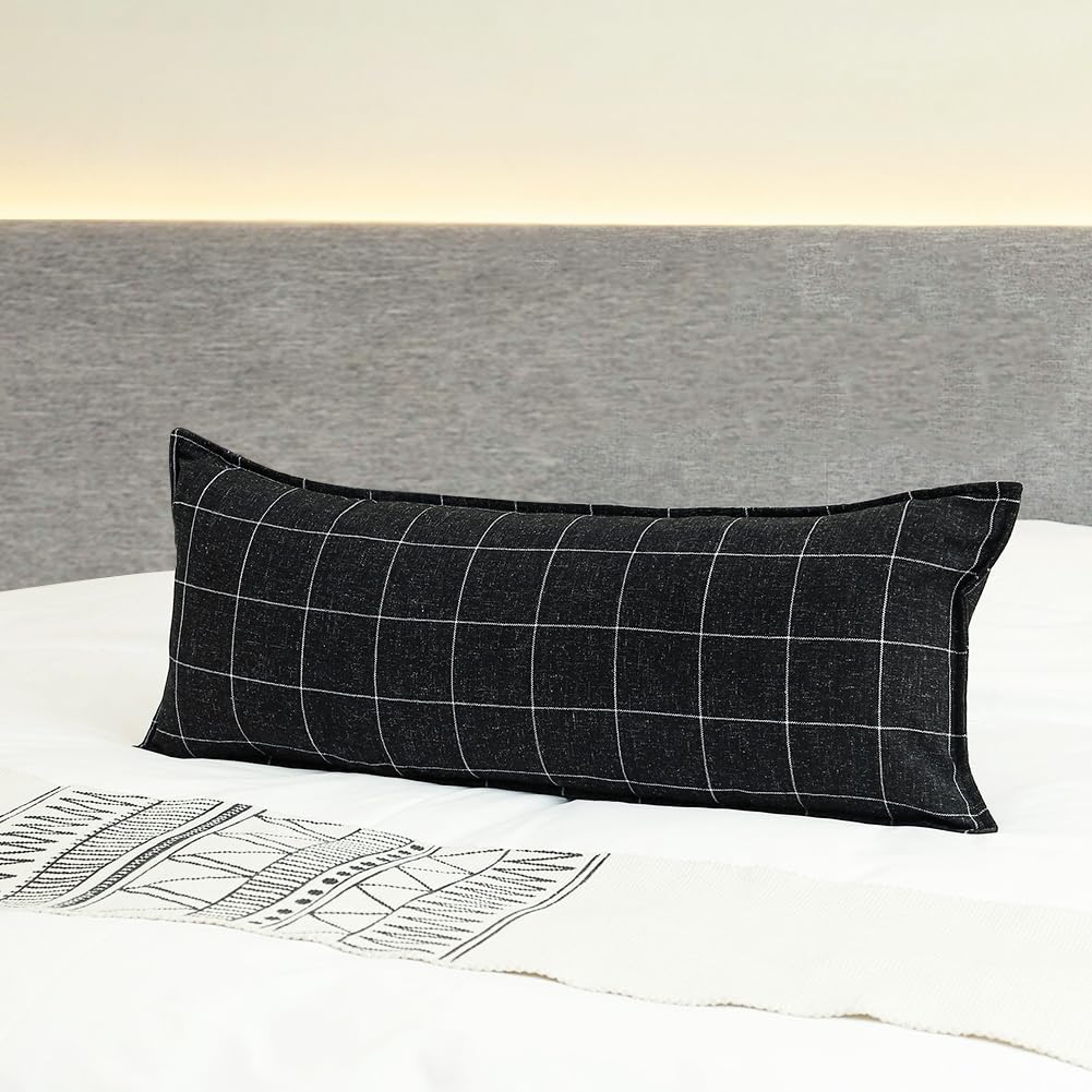 Black boho lumbar pillow cover 14x36 with a chic grid pattern, perfect for farmhouse decor on bed or couch.