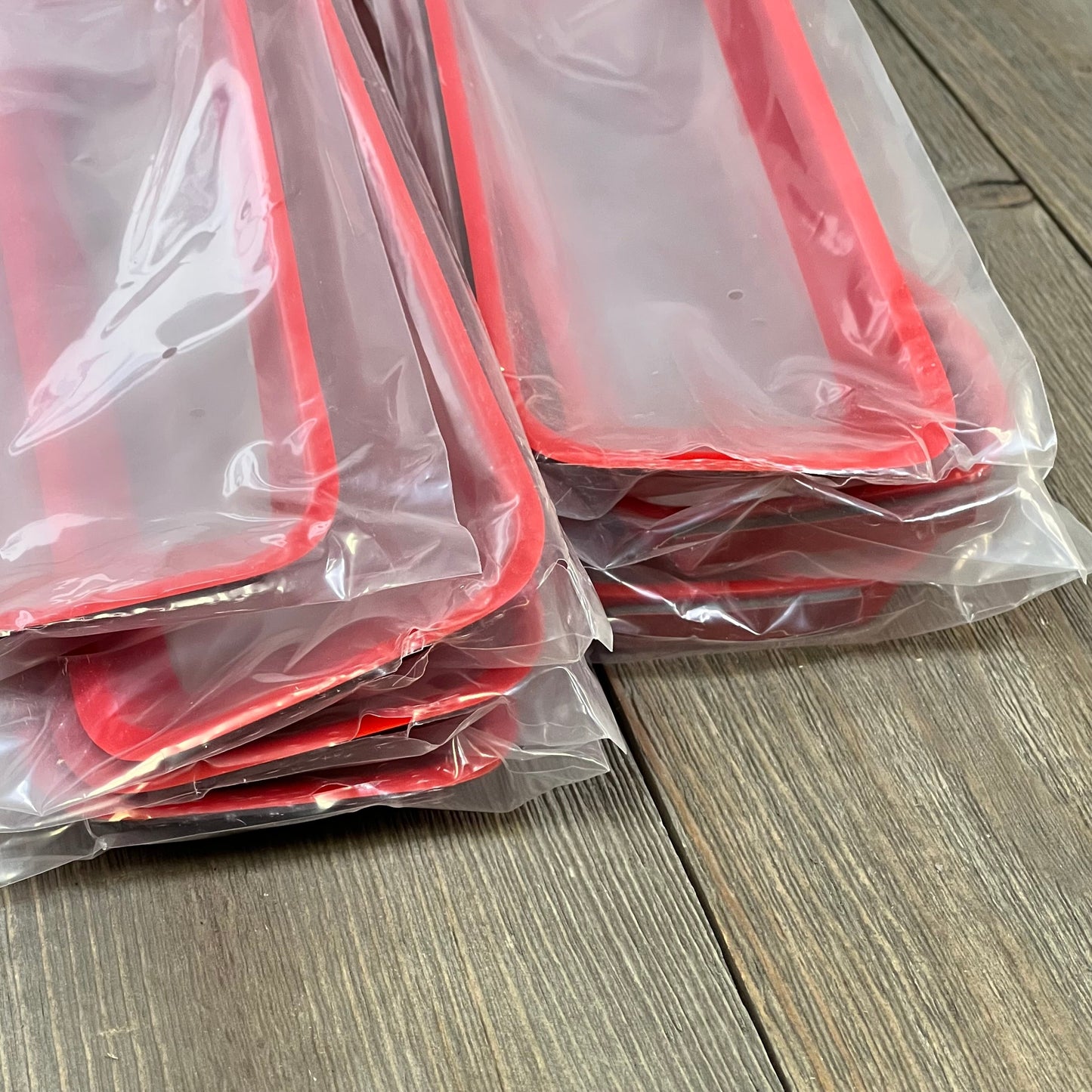 Red grille mesh inserts for Jeep Wrangler JL JLU 2018-2023, packaged and ready for installation.