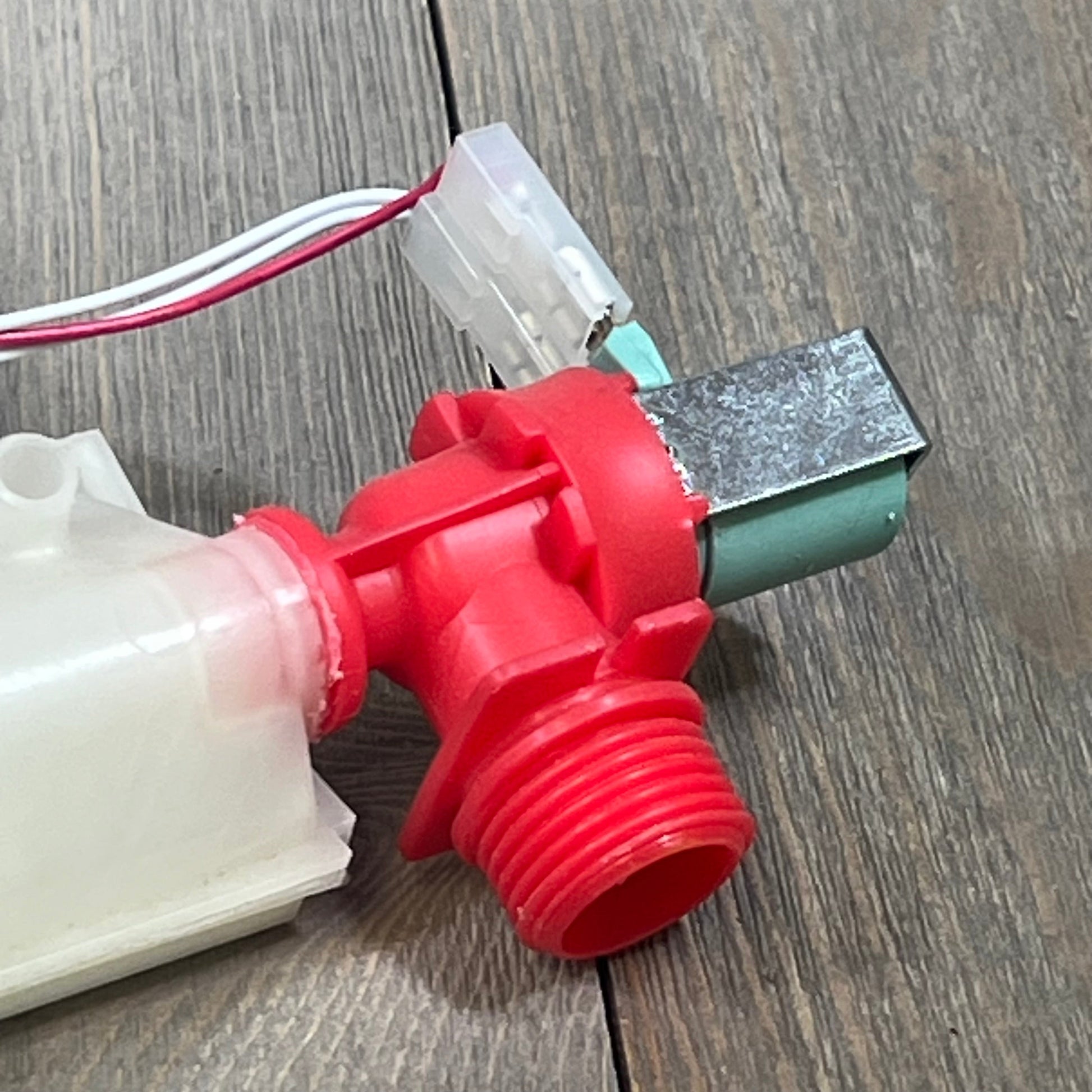 Upgraded W10869800 washer water inlet valve with red and white connectors, compatible with Whirlpool and Maytag washers.
