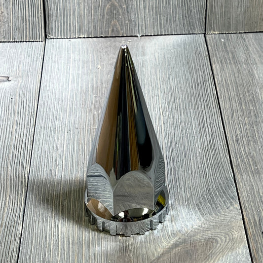 Chrome spike lug nut cover for semi trucks, 33mm x 4 3/4", sleek design, durable plastic, perfect for enhancing wheel appearance.
