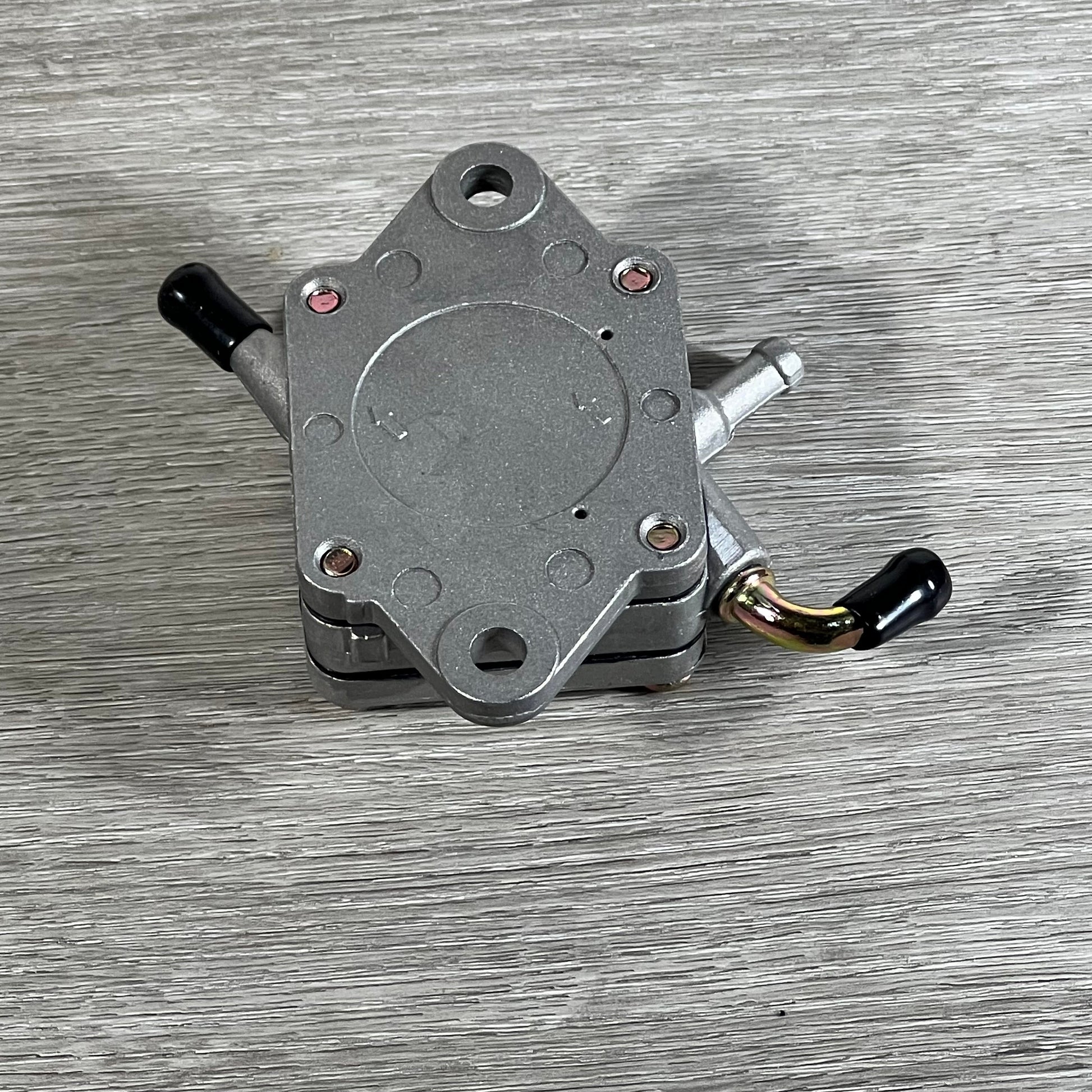 Replacement Cylinman carburetor for John Deere mowers, featuring durable metal construction and precise fittings.
