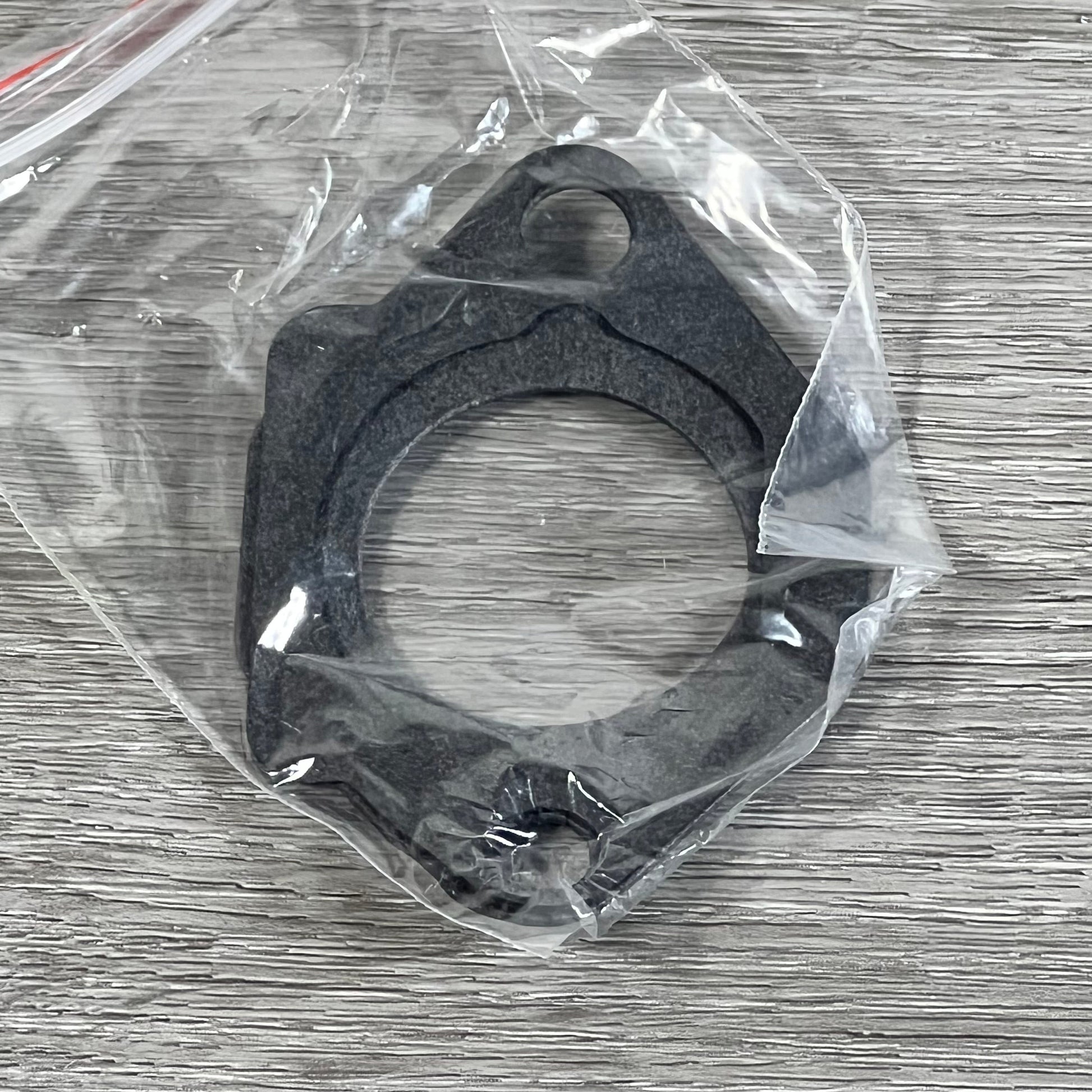 Replacement part for Cylinman Carburetor, compatible with John Deere mowers, shown in protective packaging.