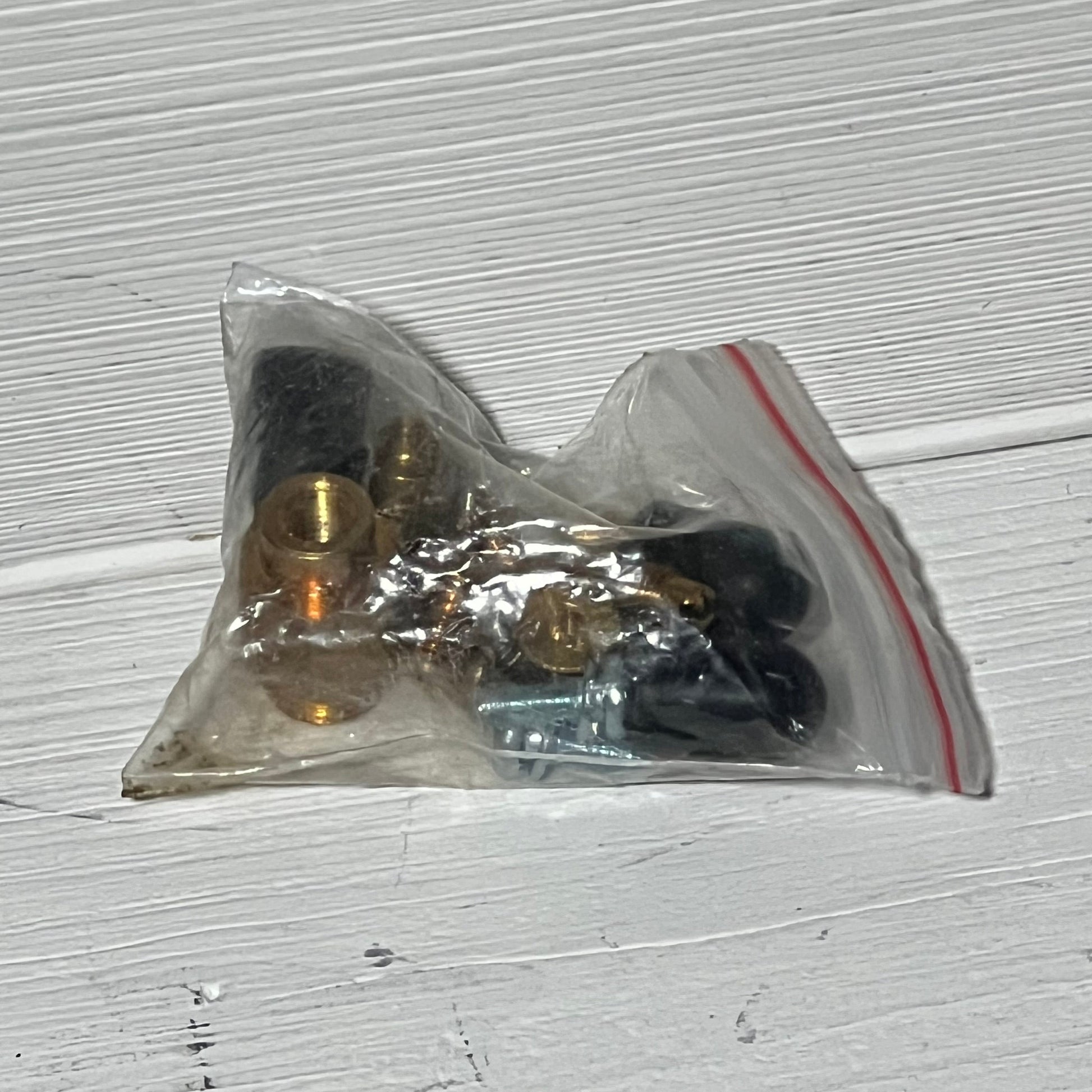 Replacement parts for Caltric Carburetor Suzuki LT-F250 Quadrunner 250 2X4 1990-1993 in a clear plastic bag.