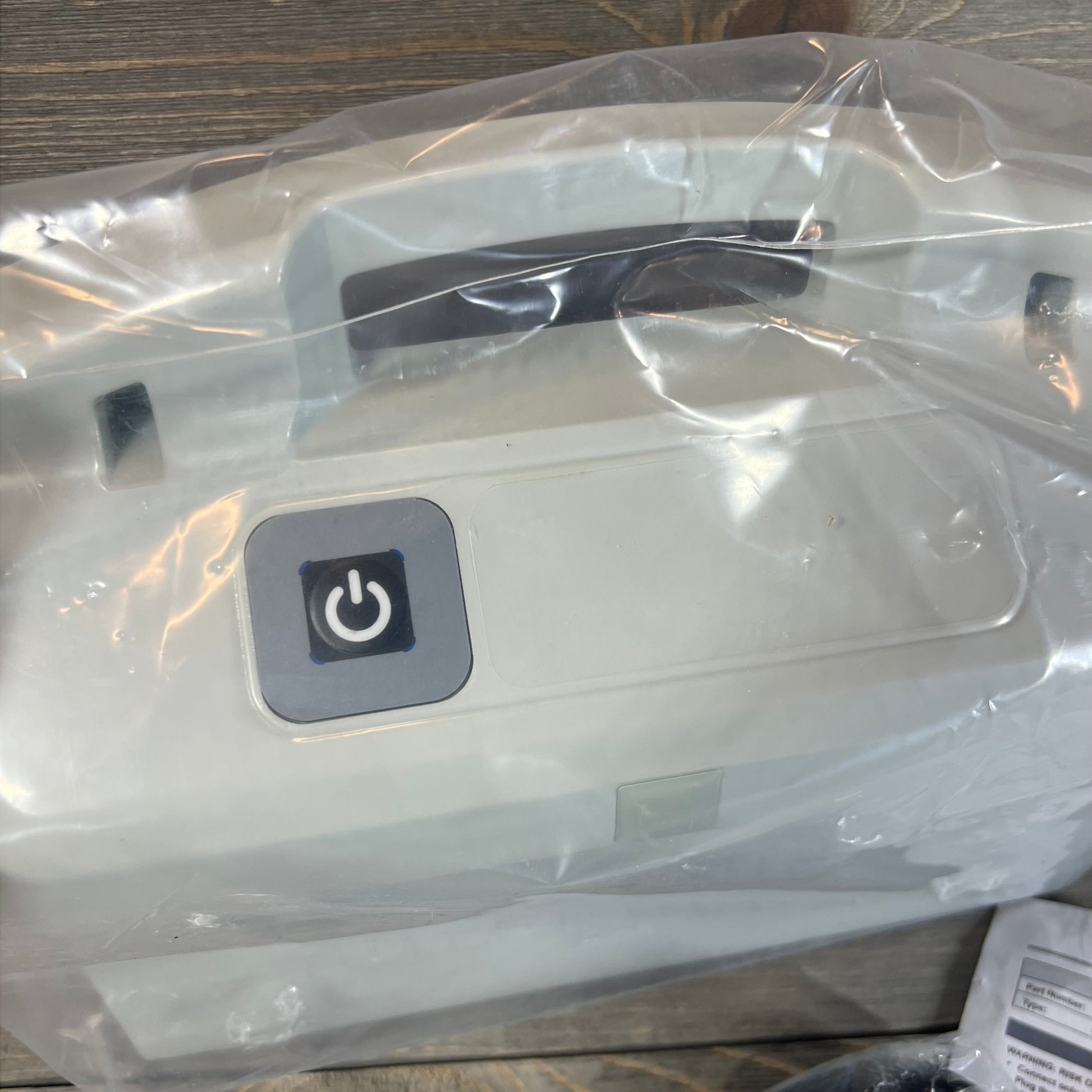 Replacement power supply for Dolphin Diagnostic models in packaging, featuring a visible power button.