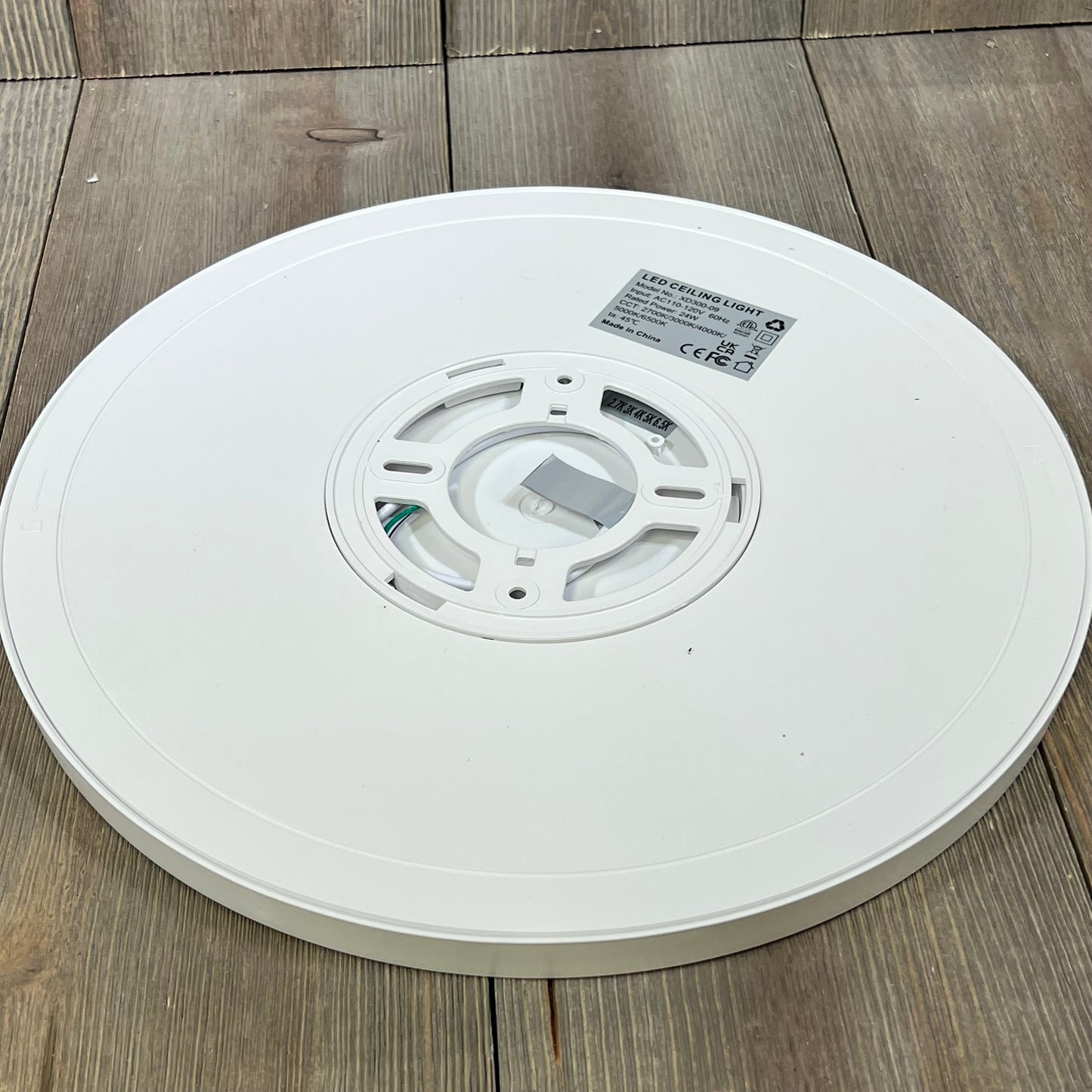 Super slim 12-inch LED flush mount ceiling light fixture, showcasing back view details, ideal for modern bedrooms.